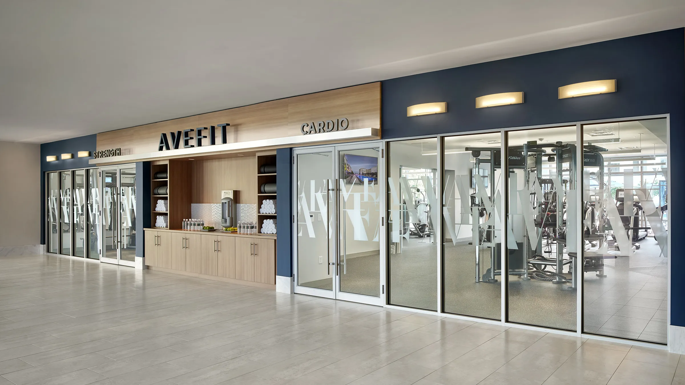 a gym with glass doors