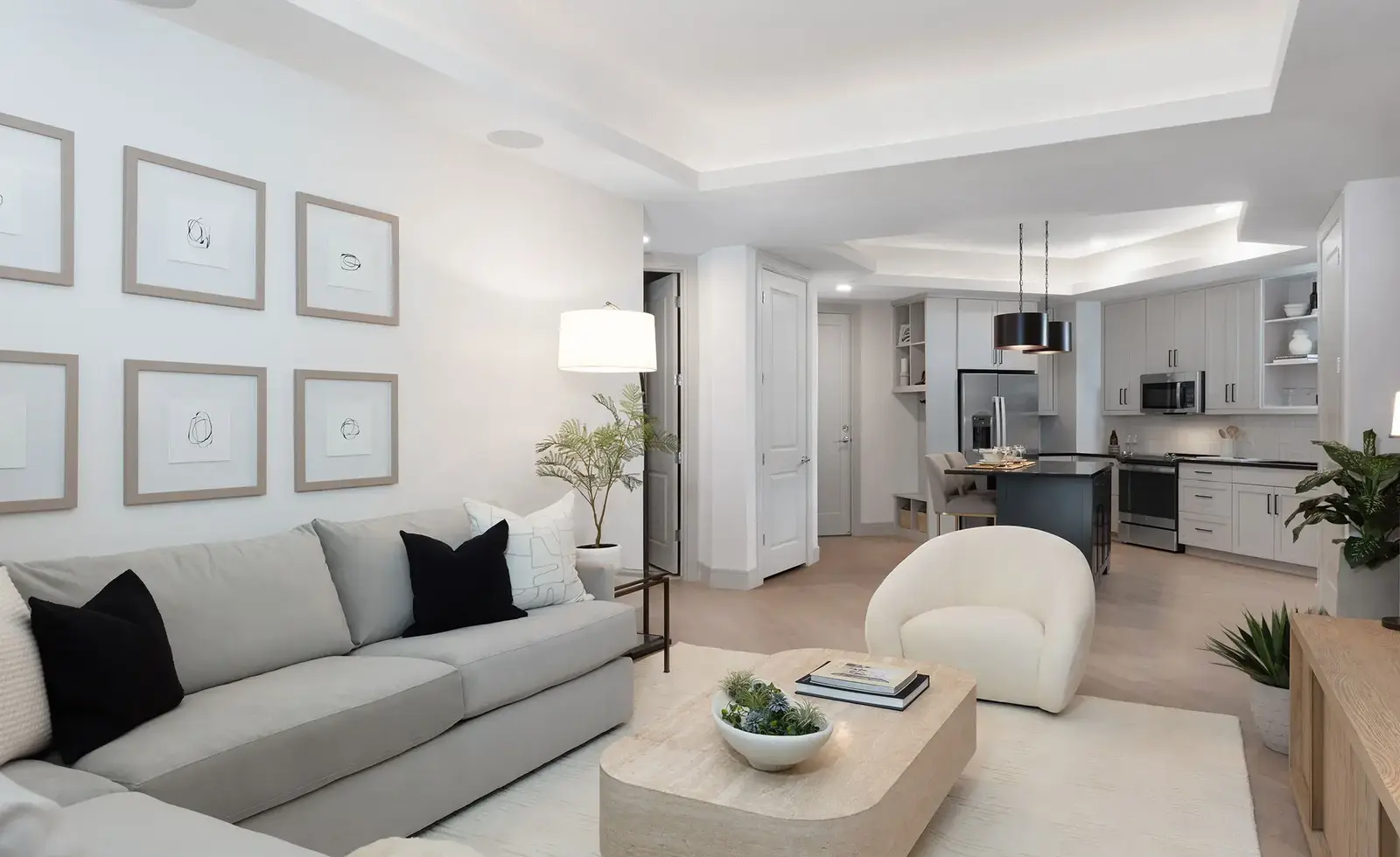 Furnished apartment living area shown — representative home at AVE Paradise Valley.