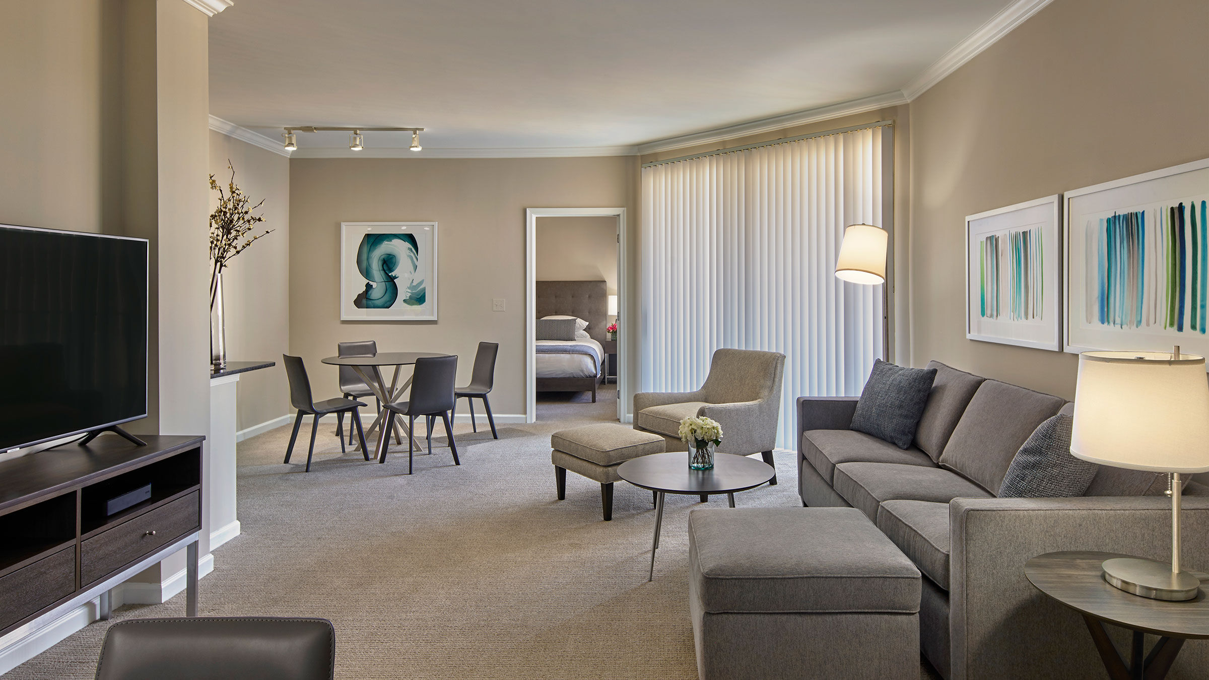 a living room with a couch and a table