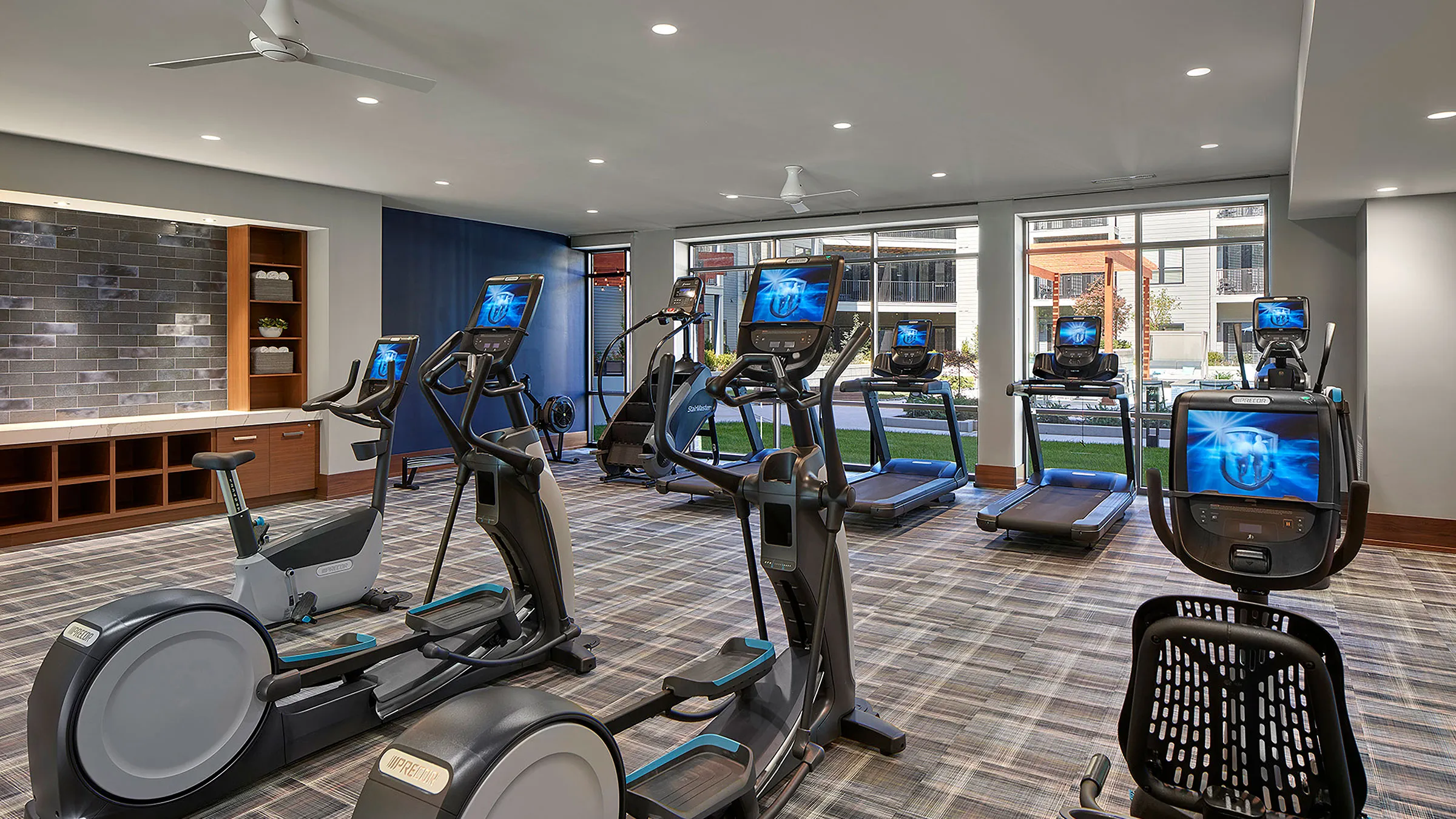 a room with treadmills and exercise machines