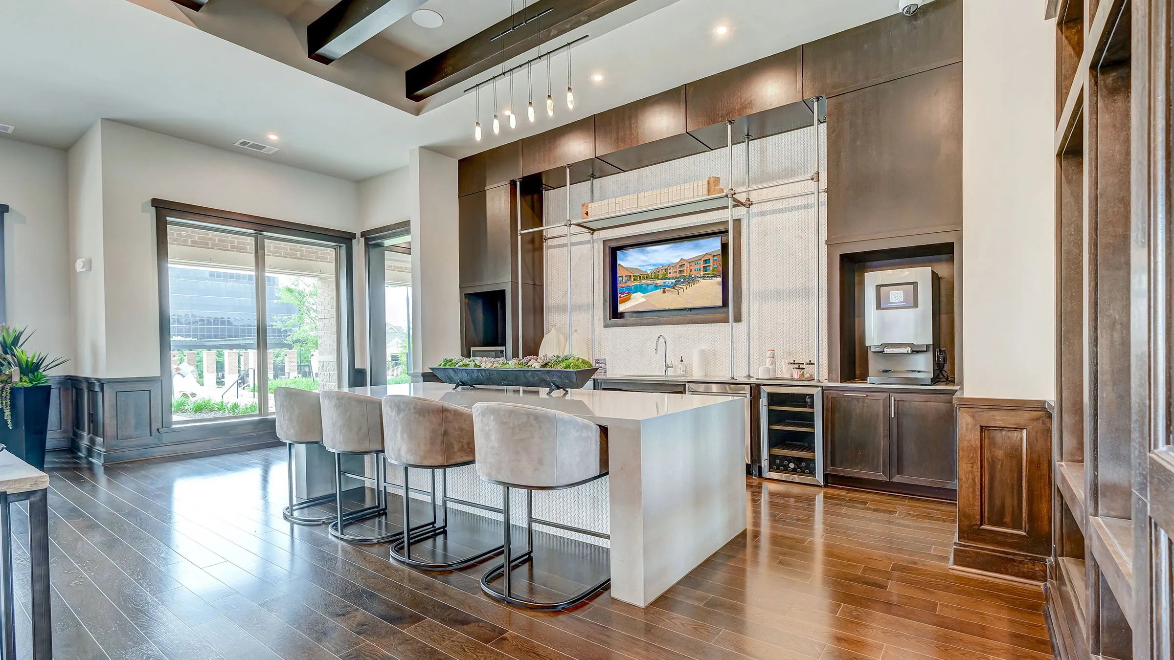 a room with a bar and a television