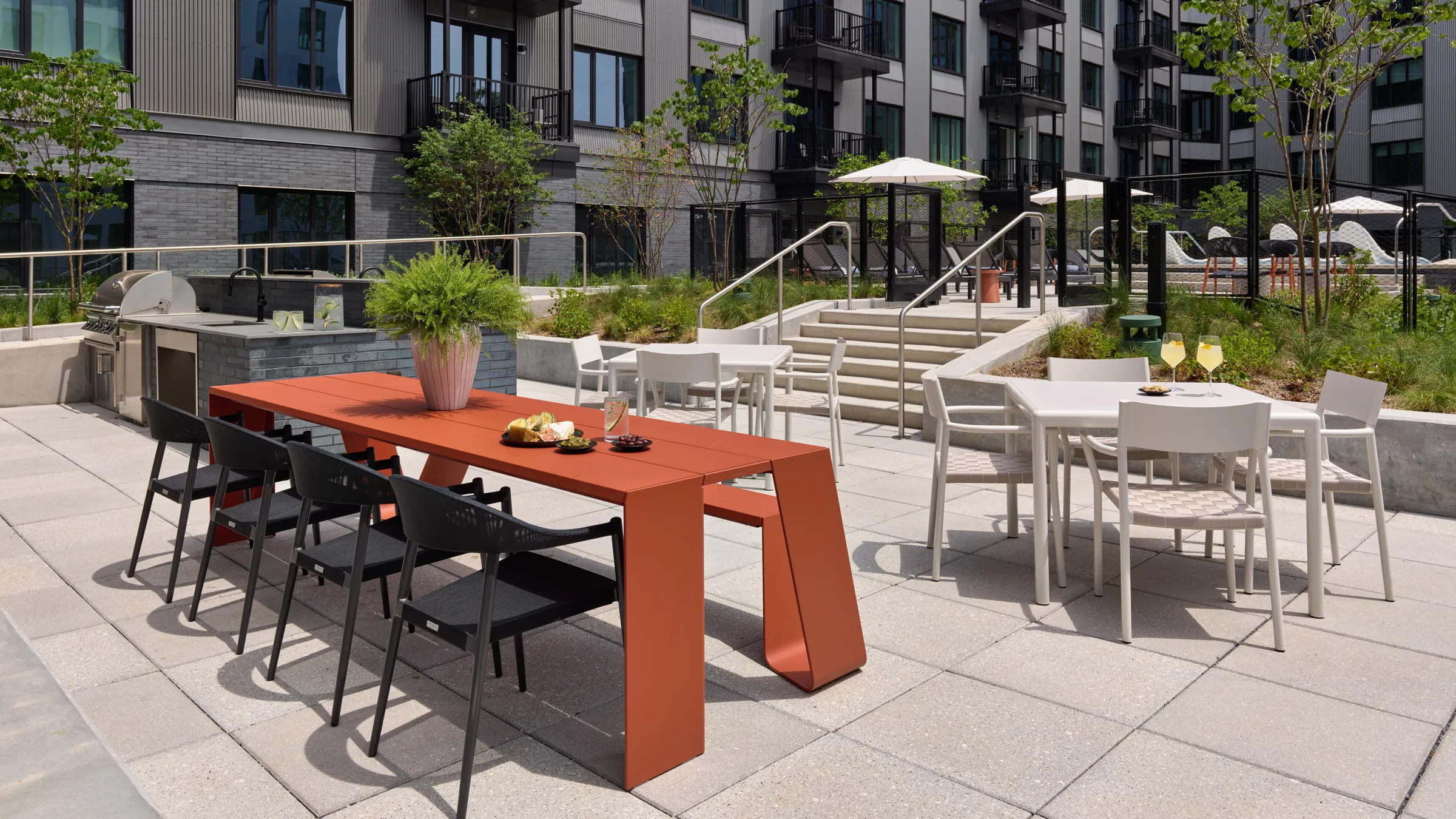 resort sundeck with outdoor grilling station and dining areas in philadelphia