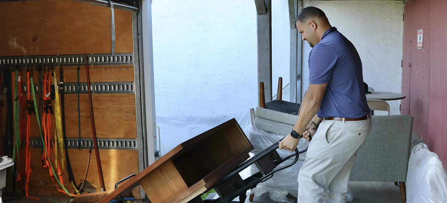 a man pushing a cart
