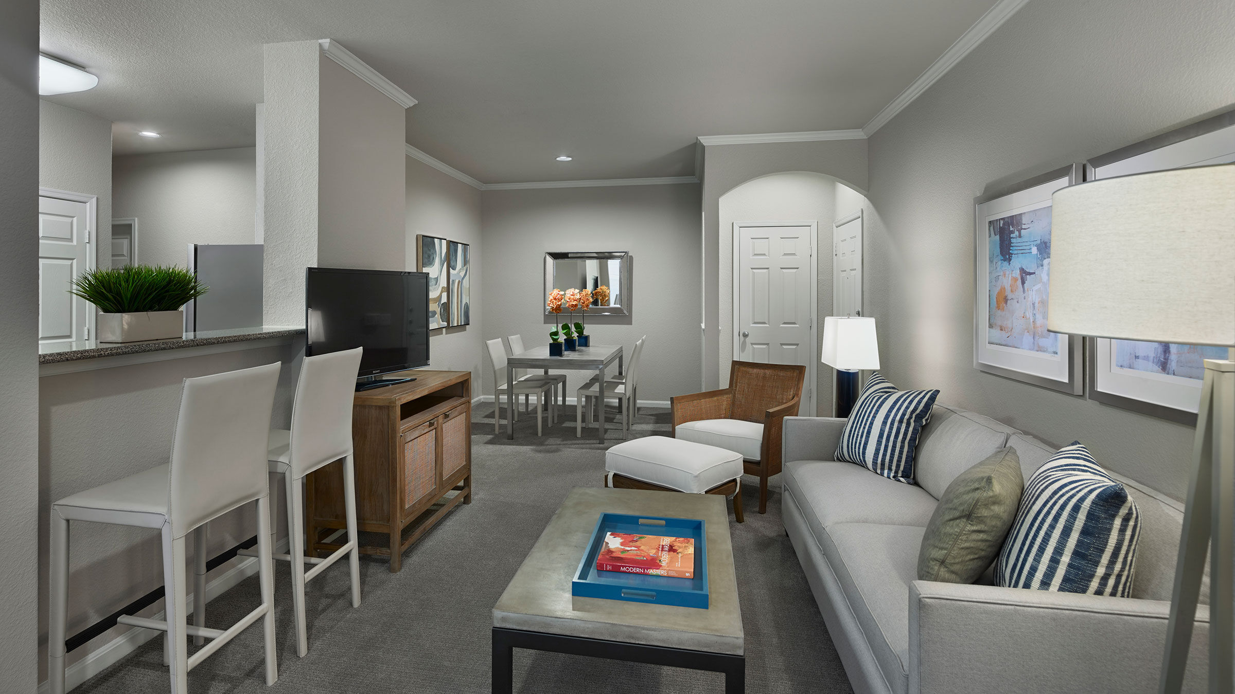 a living room with a tv and a couch