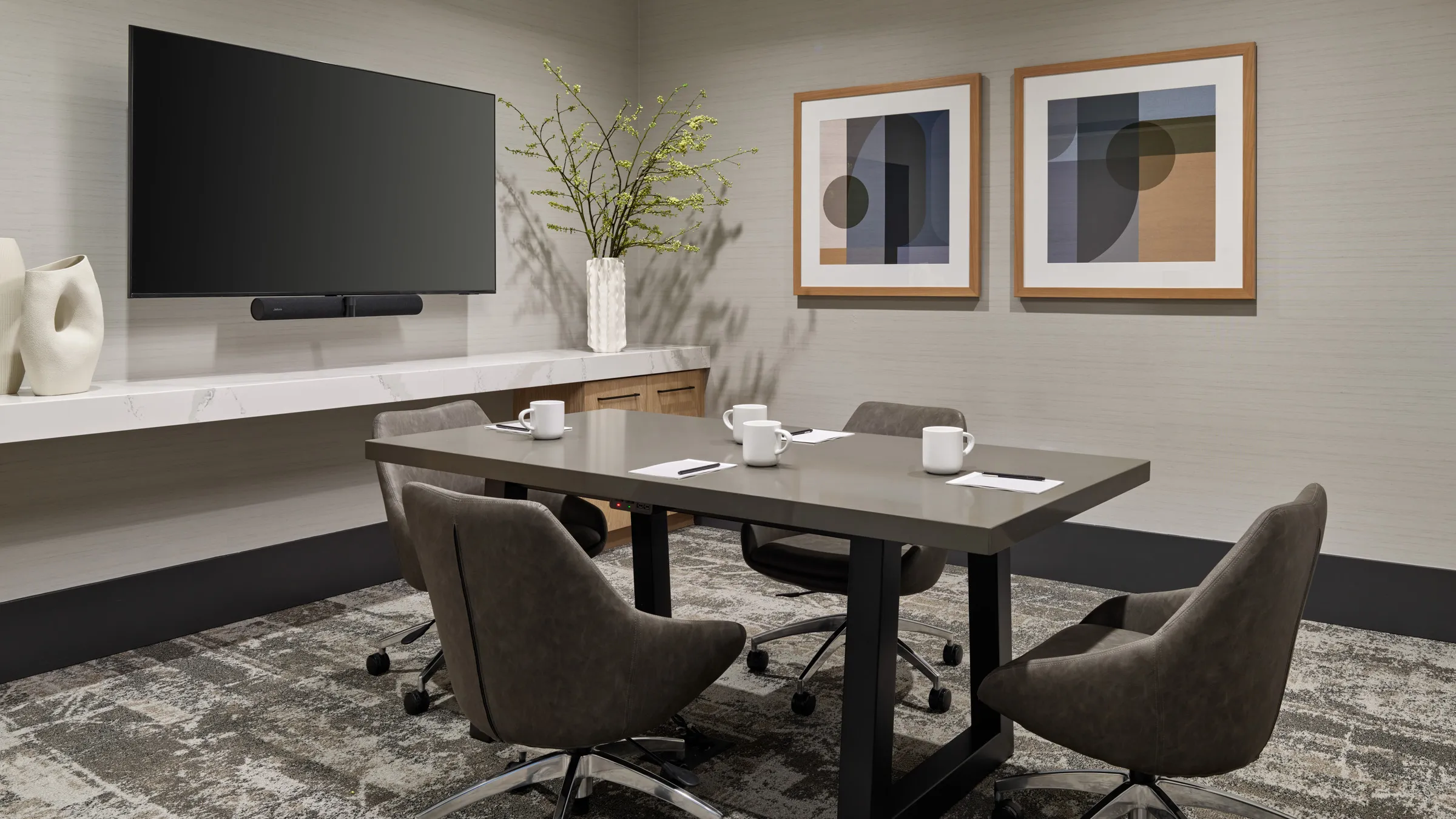 a room with a table and chairs