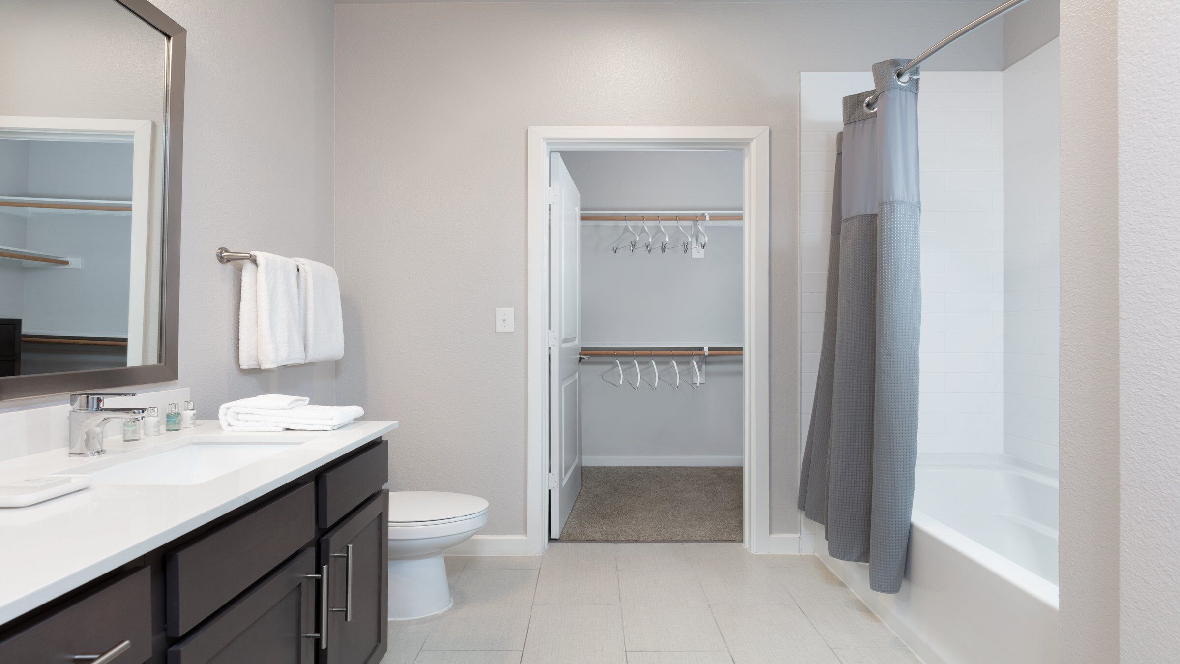 a bathroom with a shower and a toilet