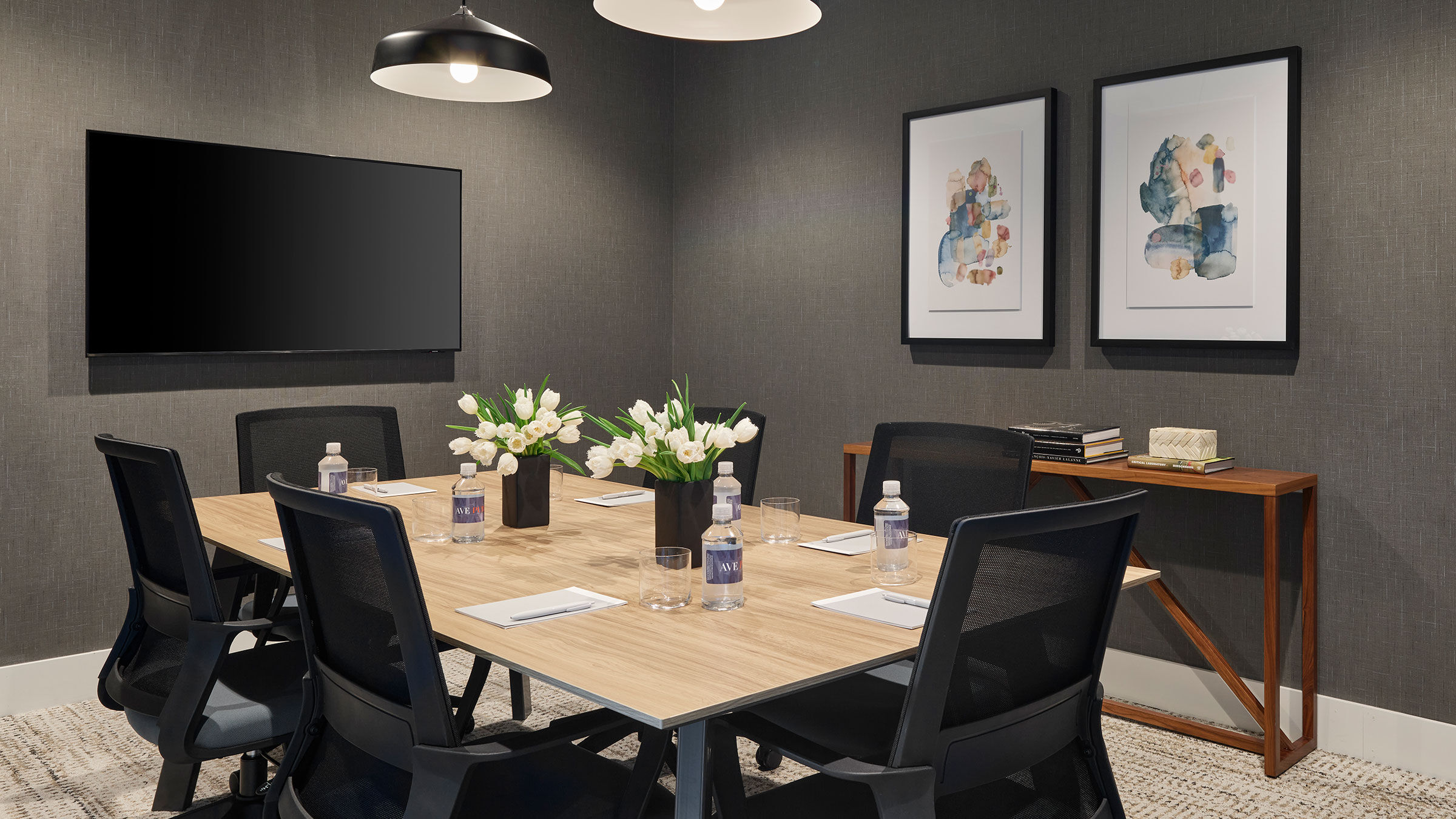 a room with a table and chairs