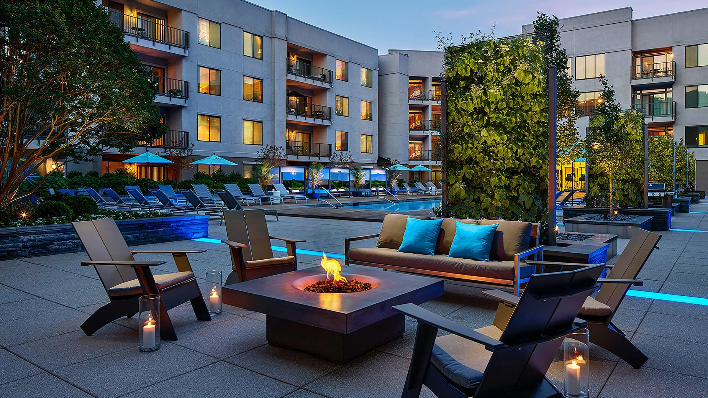 a fire pit in front of a building