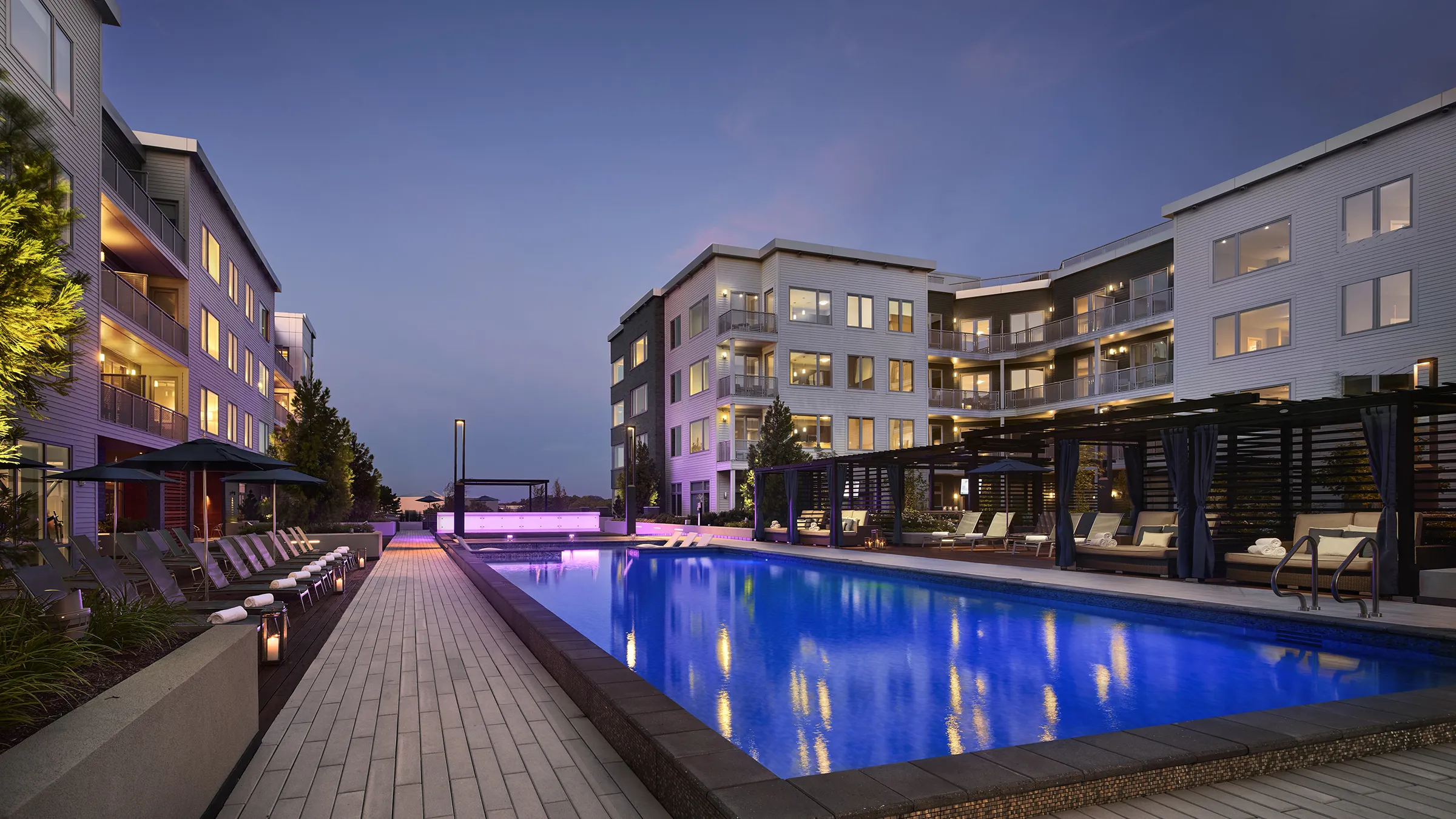 a swimming pool and an apartment building