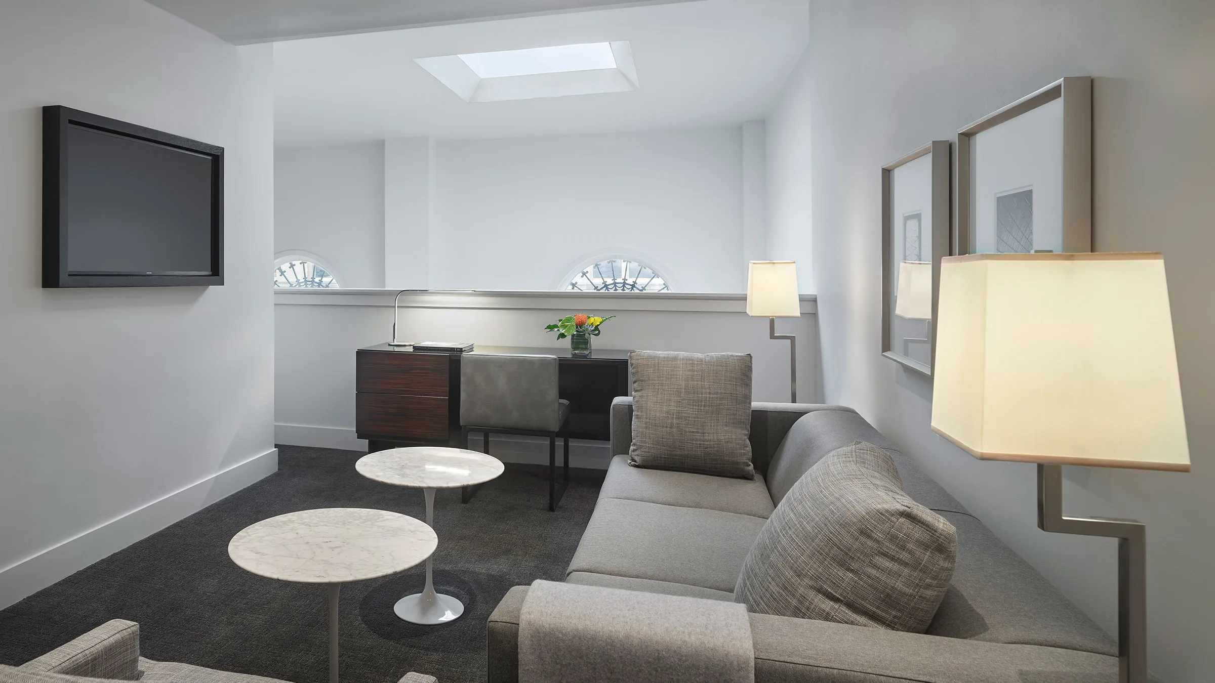 a living room with a couch and a table