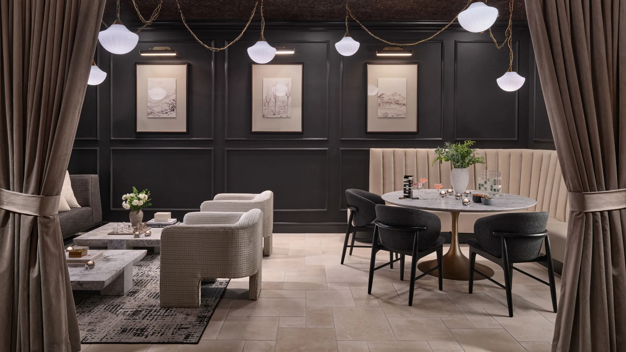 a room with a round table and chairs