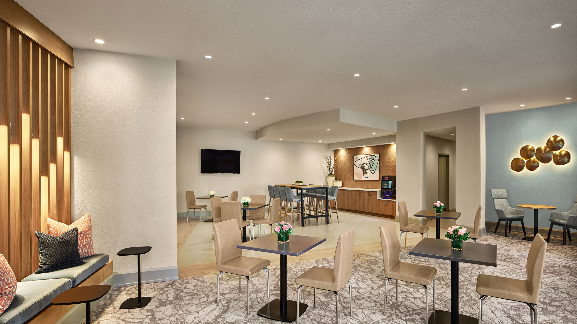 a room with tables and chairs