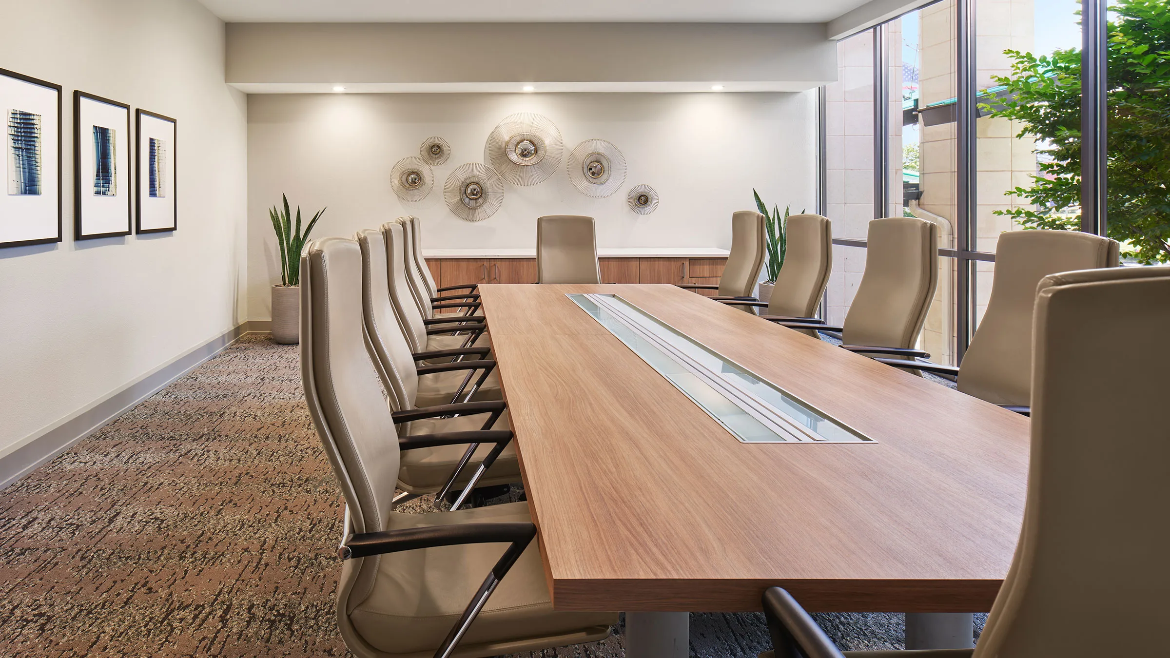 a conference room with a table and chairs