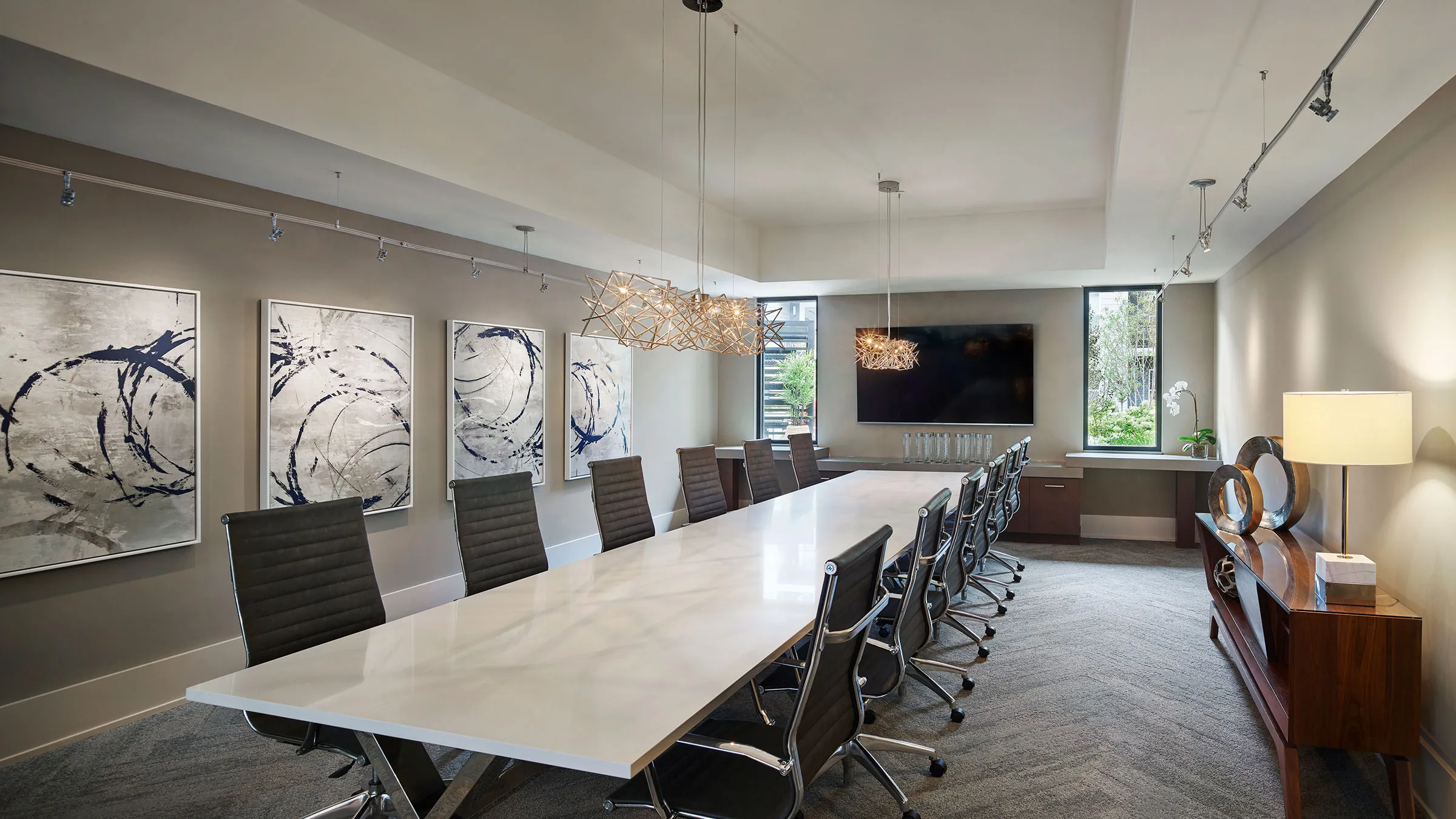 a conference room with a long table and chairs