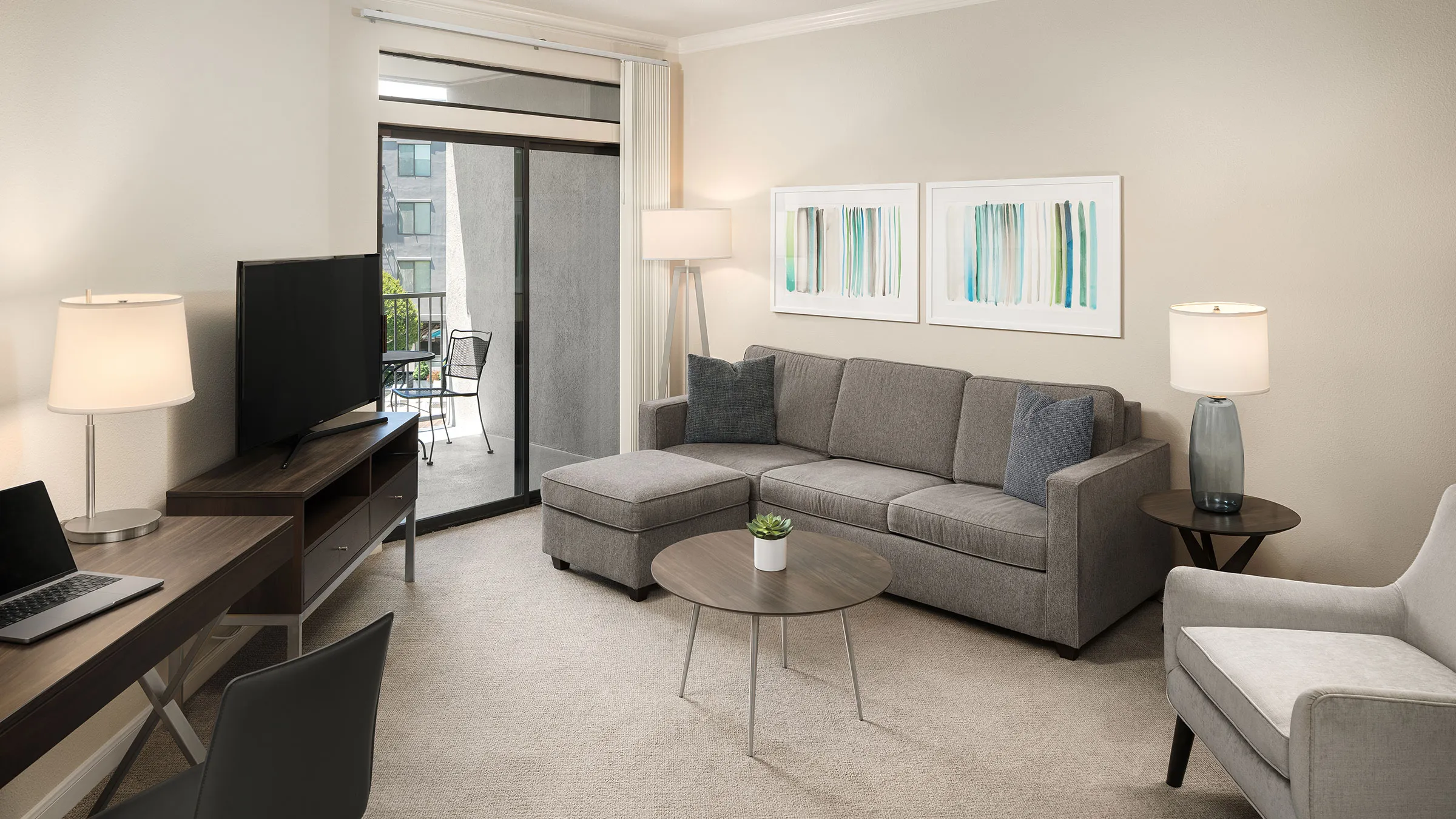 a living room with a couch and a tv