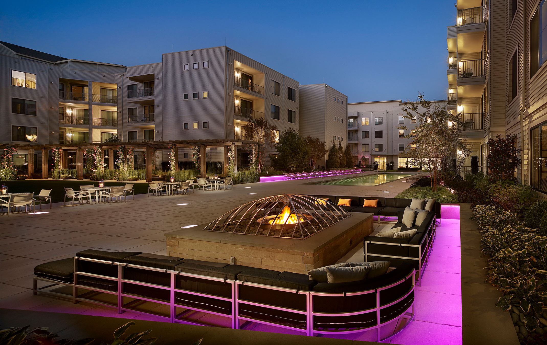 a fire pit in front of a building