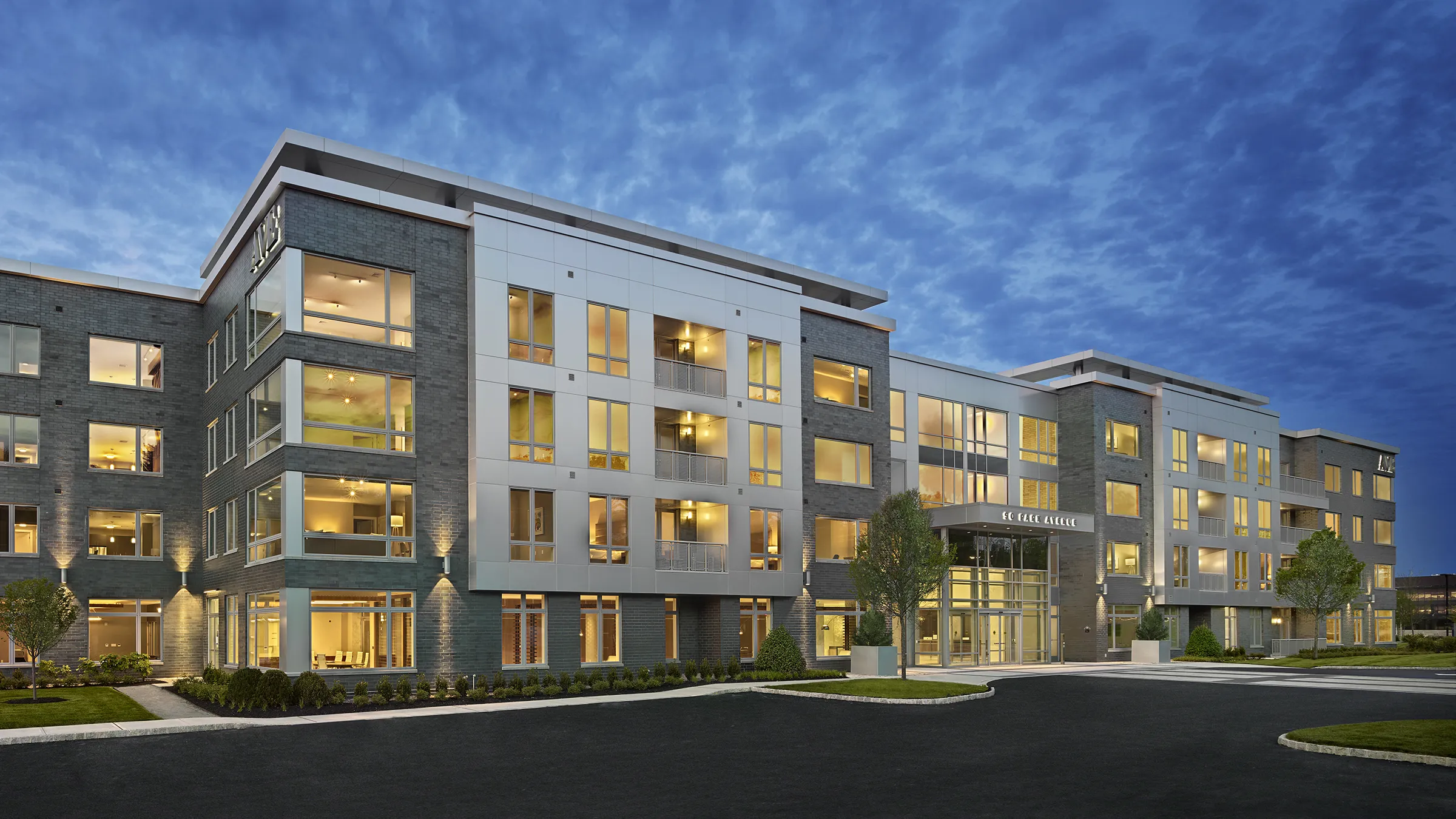 AVE Florham Park Luxury Apartments Building Exterior at Dusk