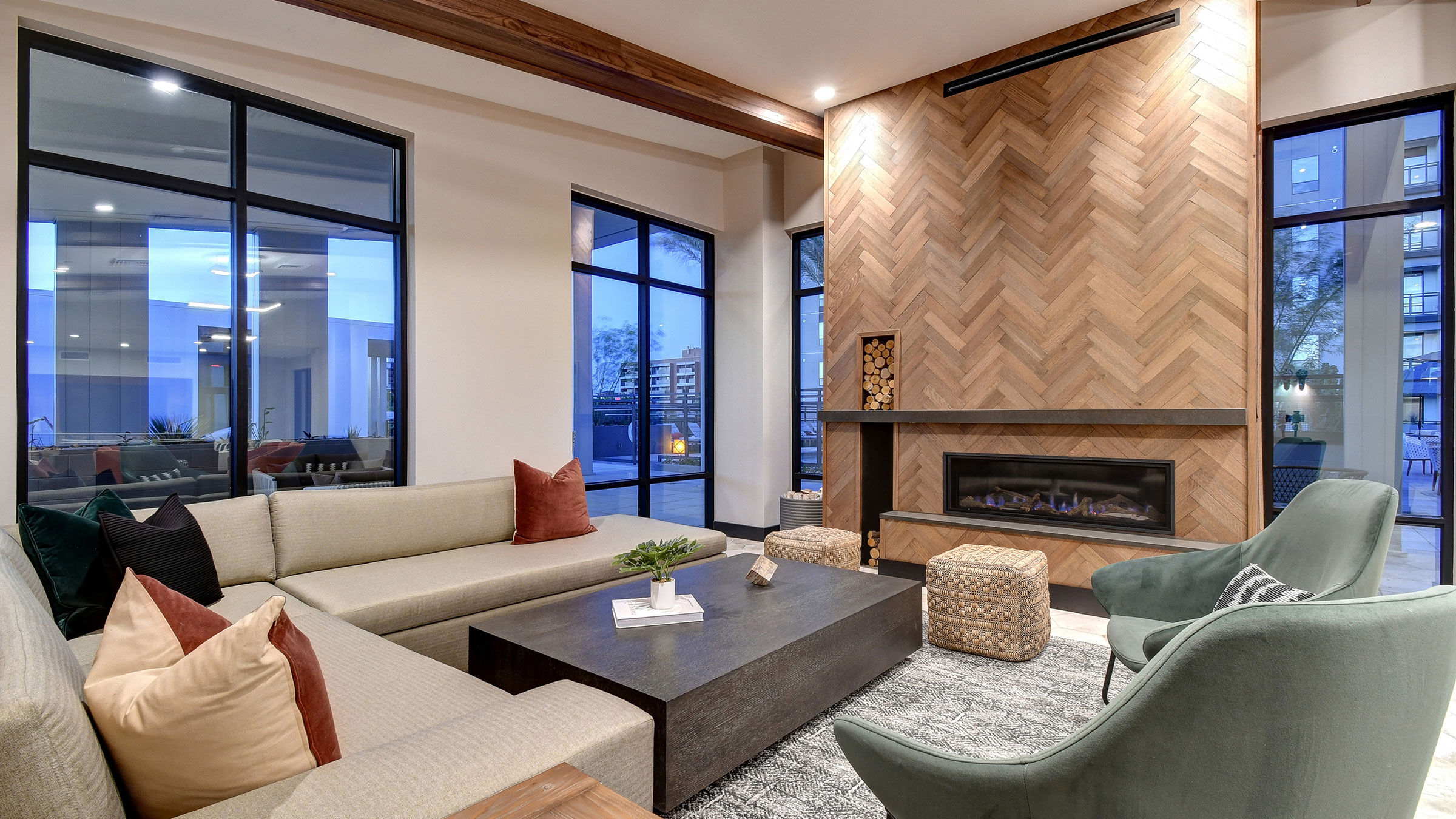 a living room with a fireplace and couches