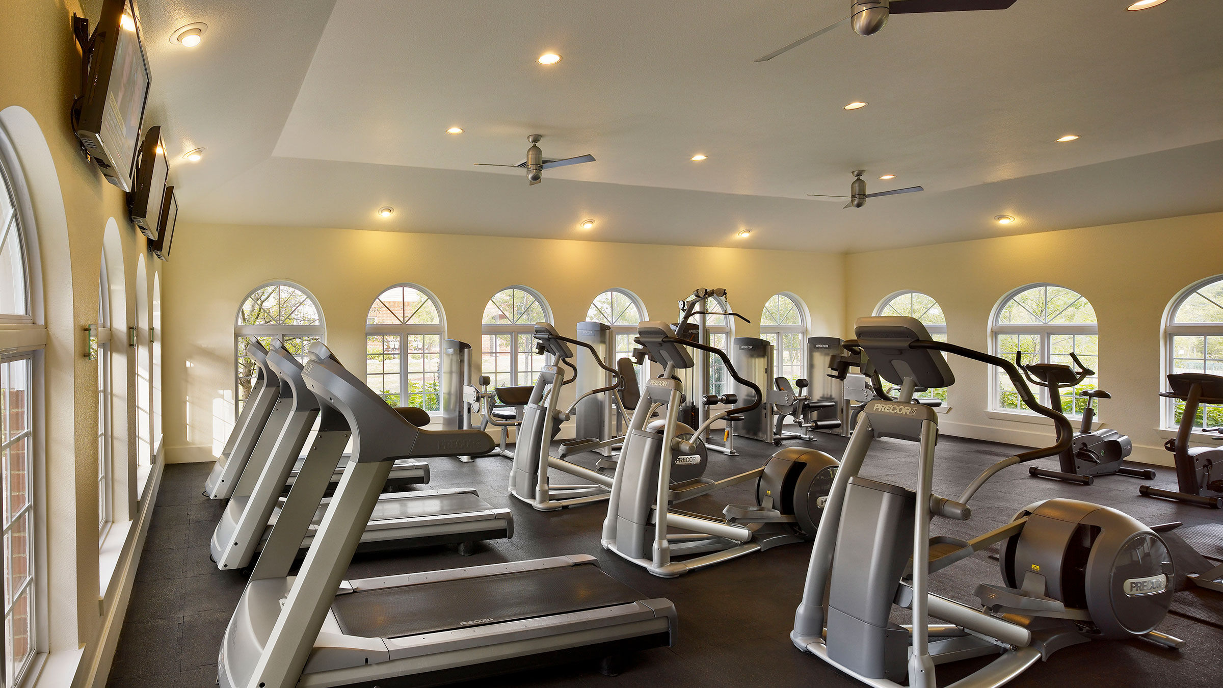 a large gym with exercise equipment