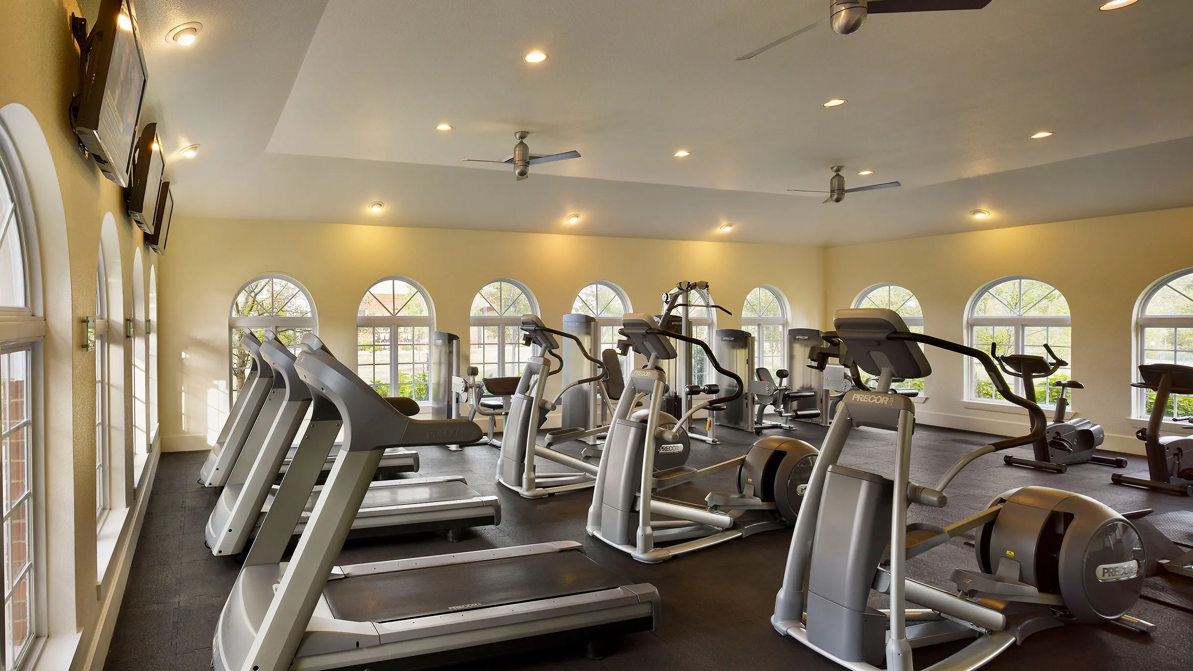 a large gym with exercise equipment