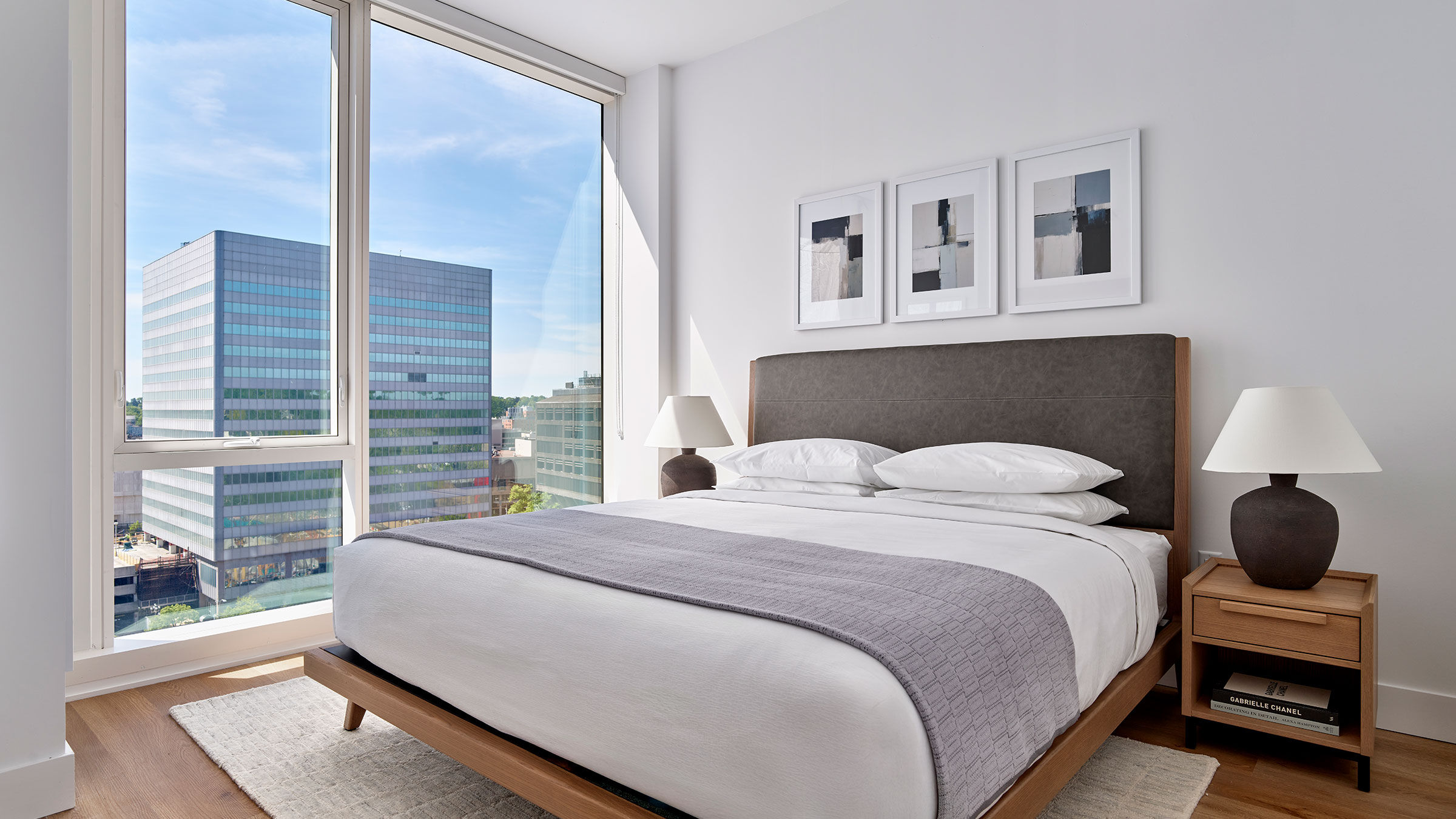 a bed with a large window