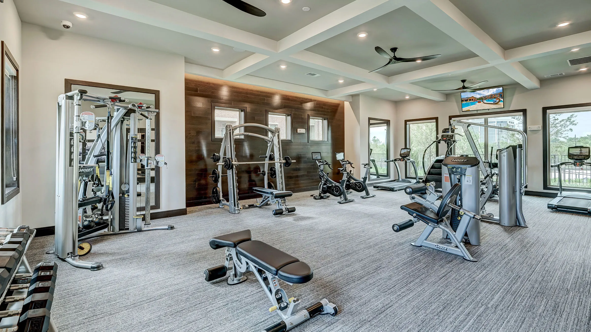 a large room with exercise equipment