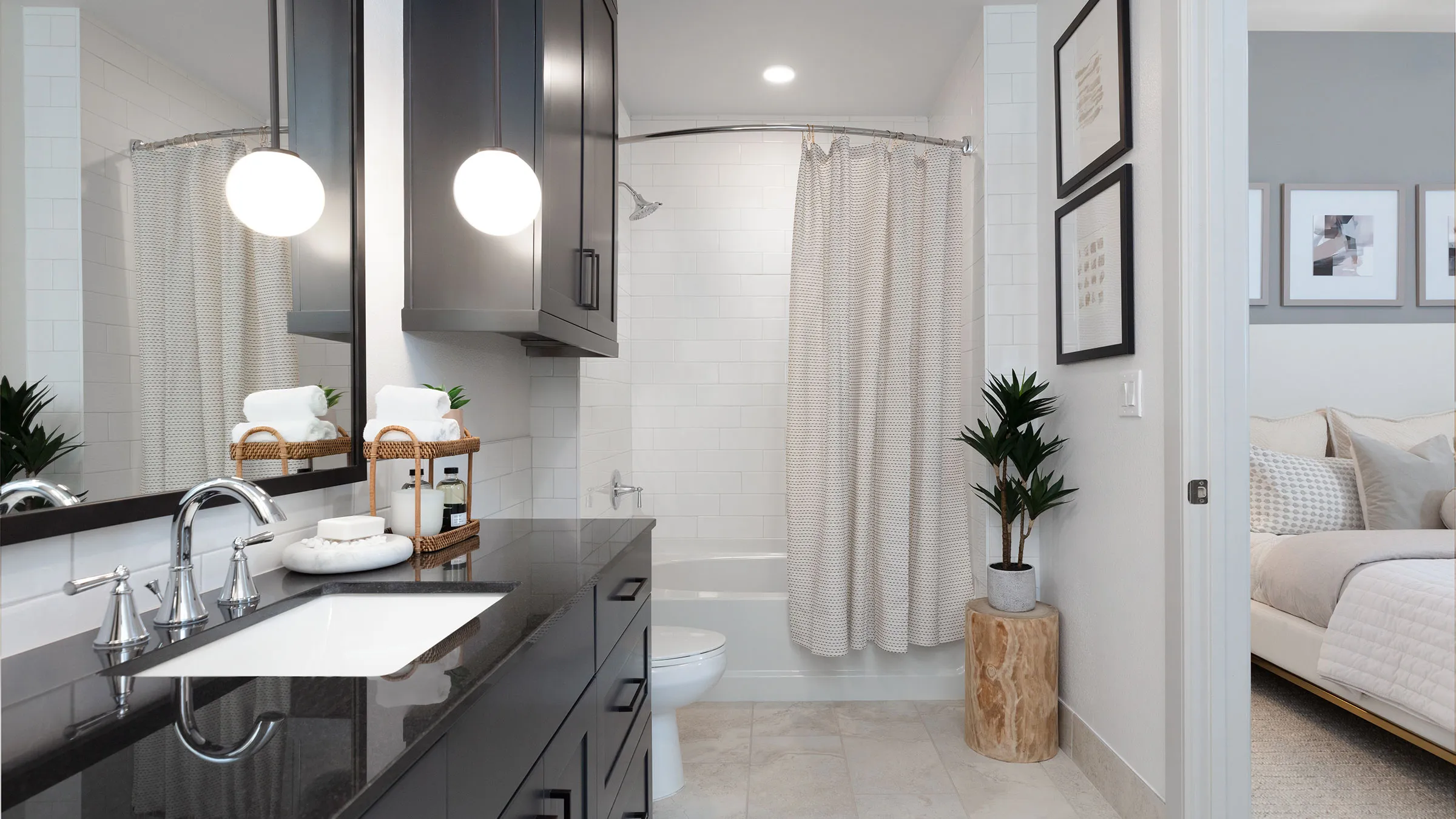 a bathroom with a shower curtain and sink