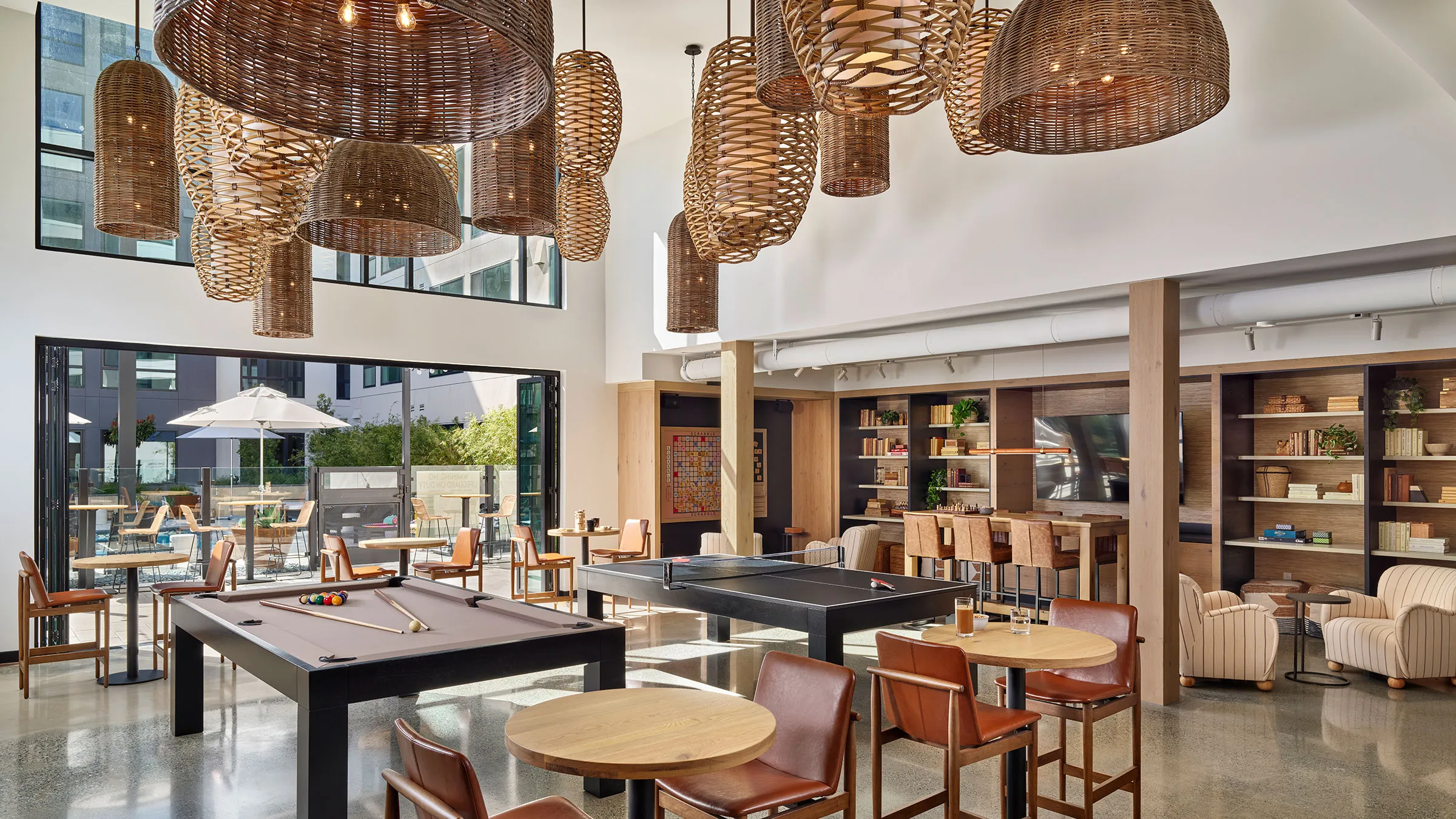 a pool table and chairs in a room