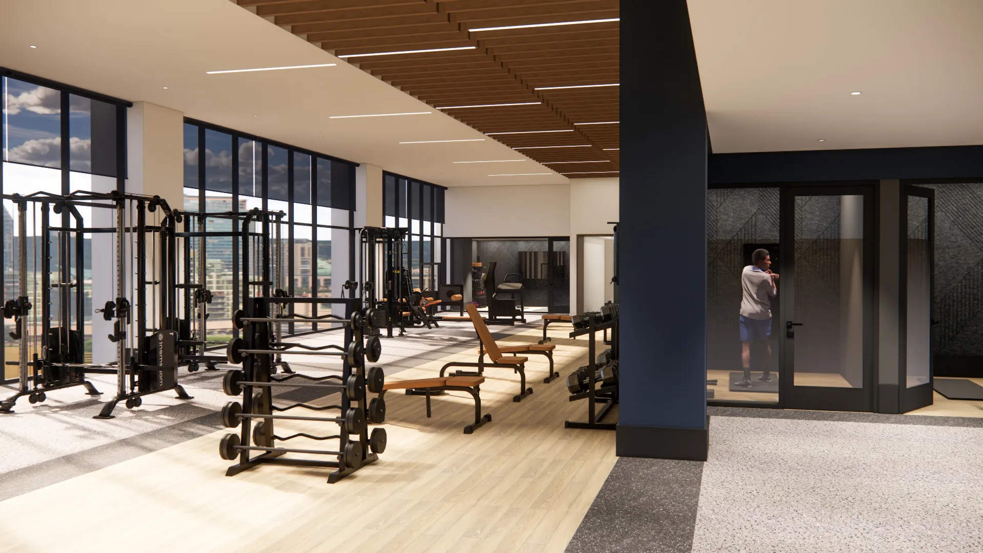 a large gym with weights and equipment