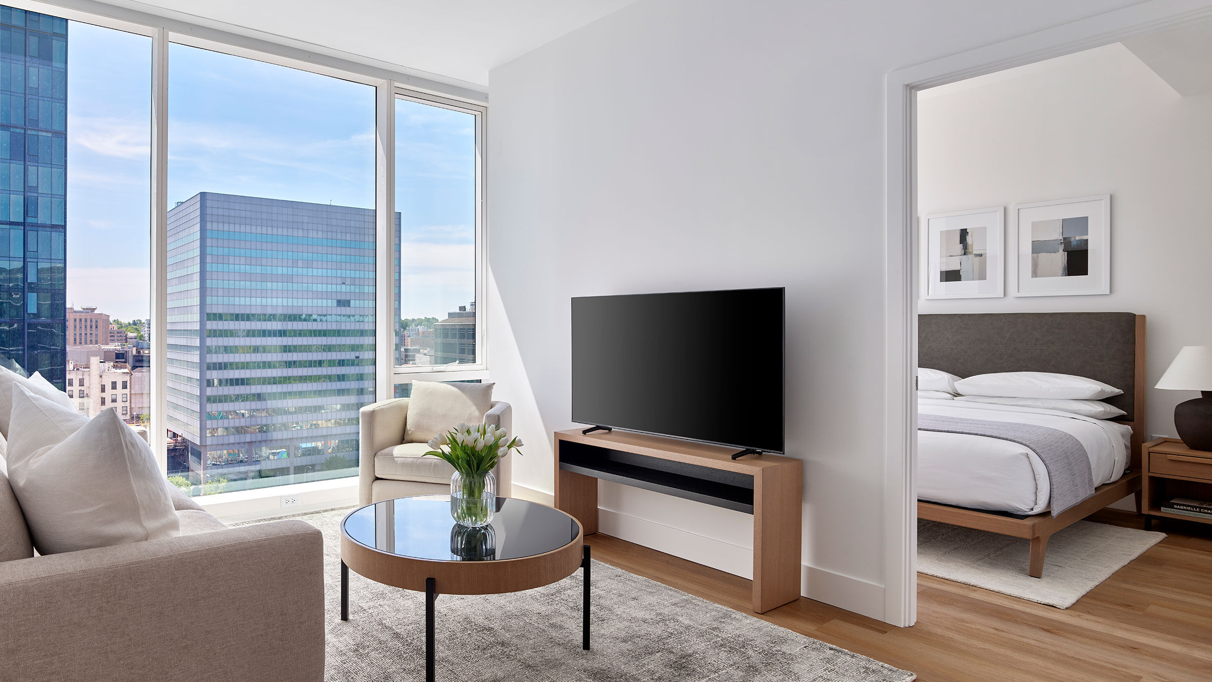 a living room with a television and a couch