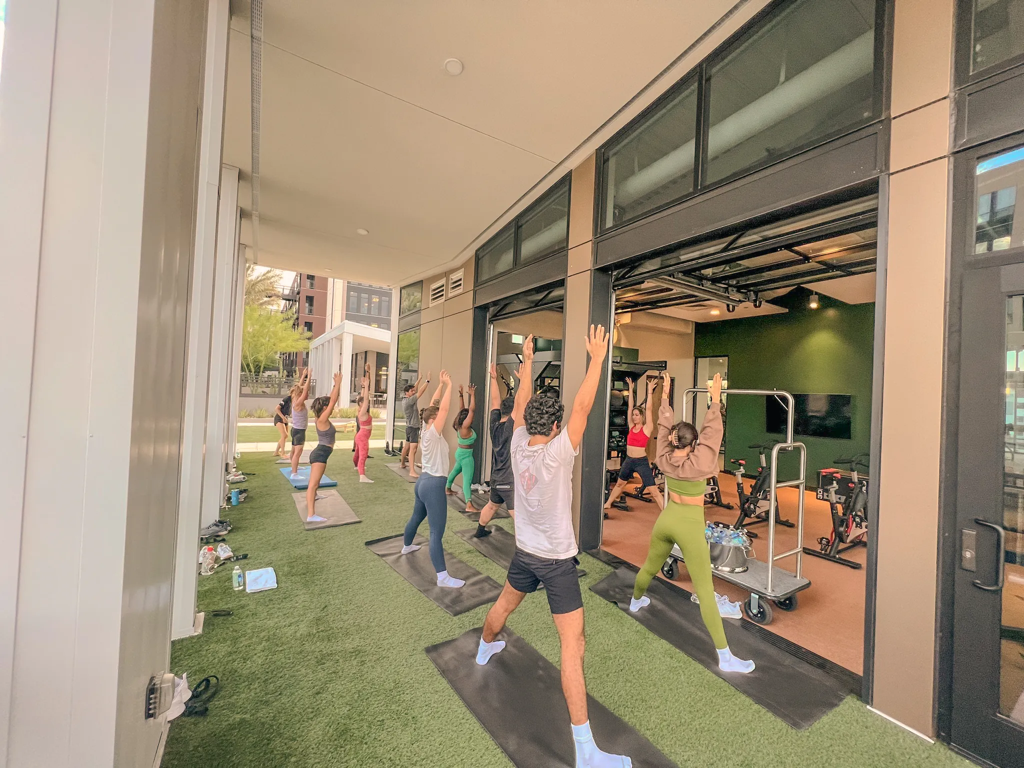 a group of people stretching outside