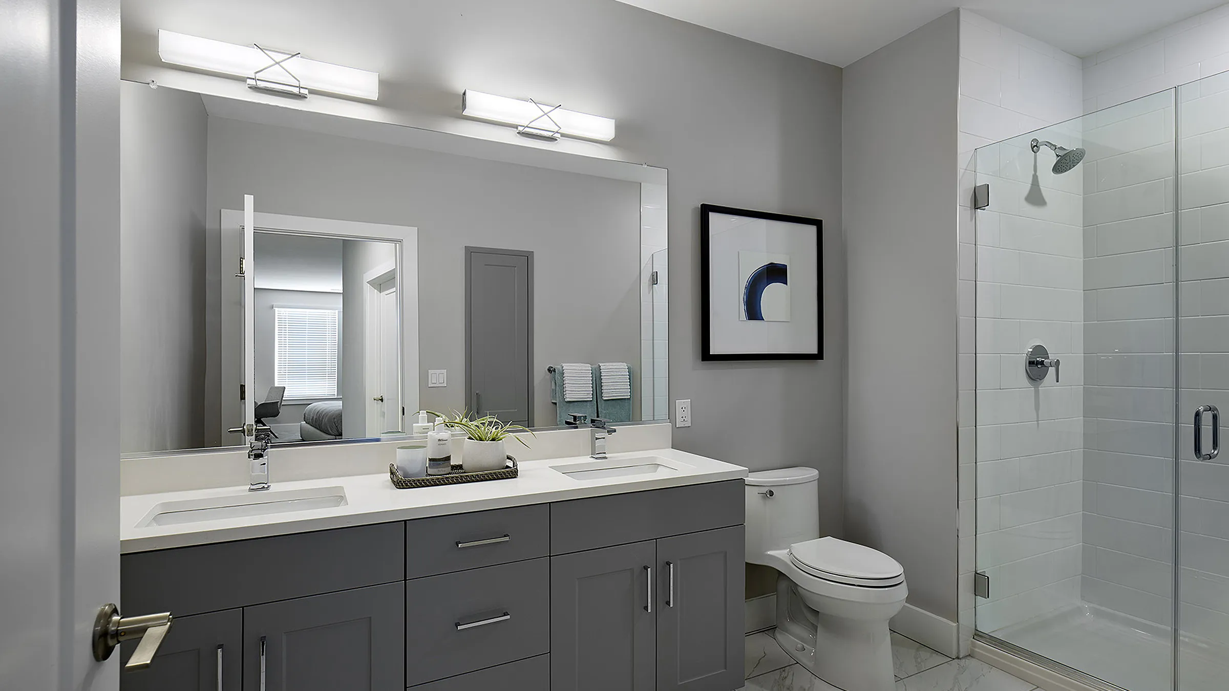 a bathroom with a mirror and sink