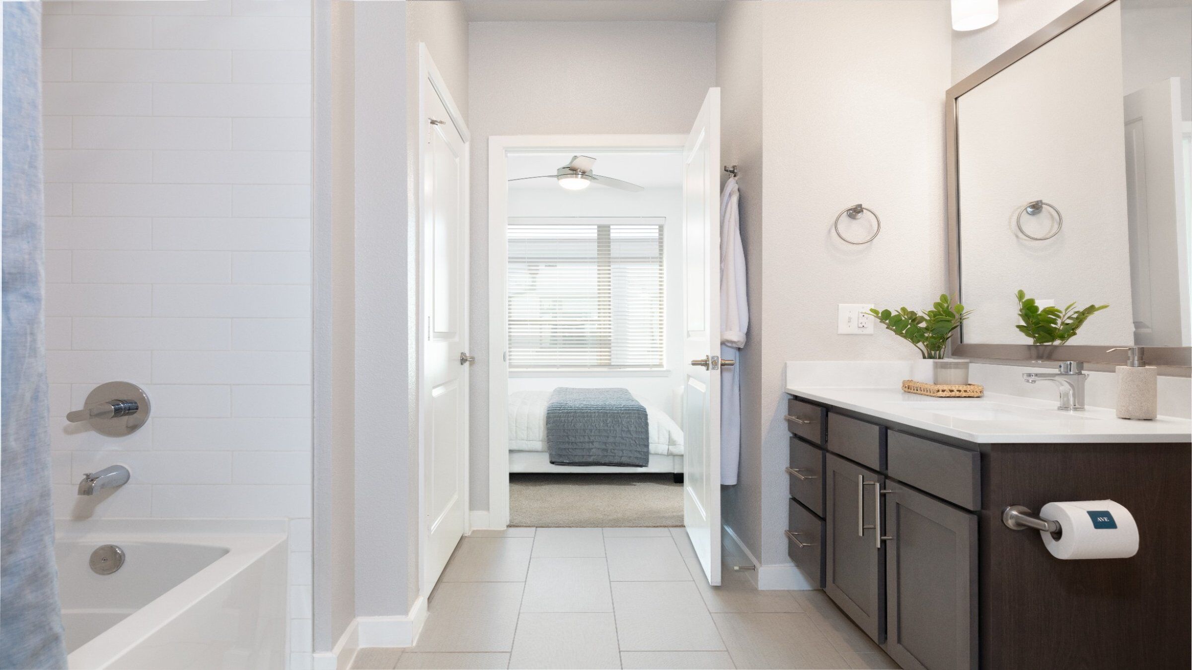 a bathroom with a sink and a window