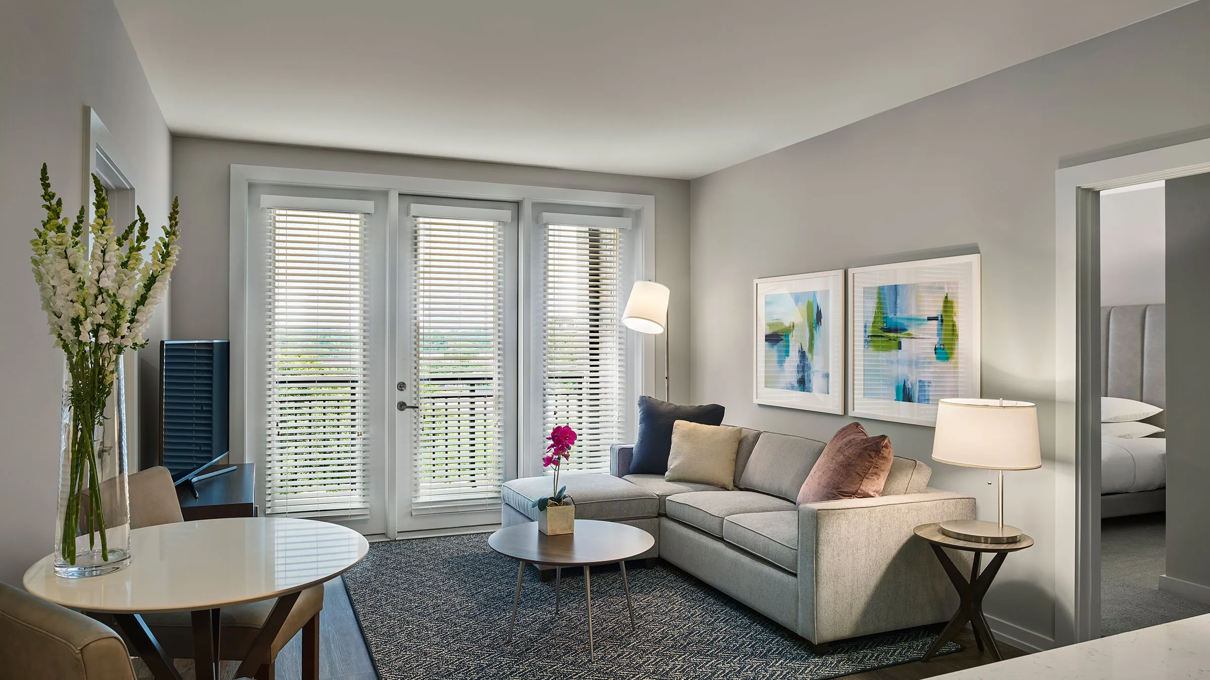 a living room with a couch and a table