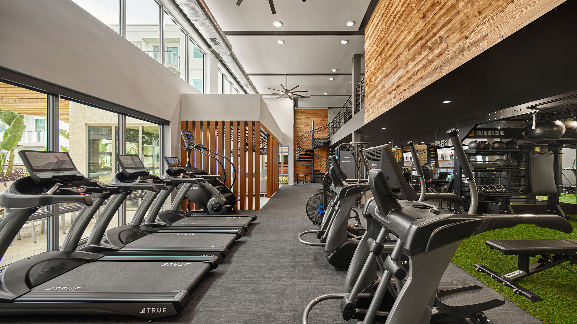 a room with treadmills and exercise machines