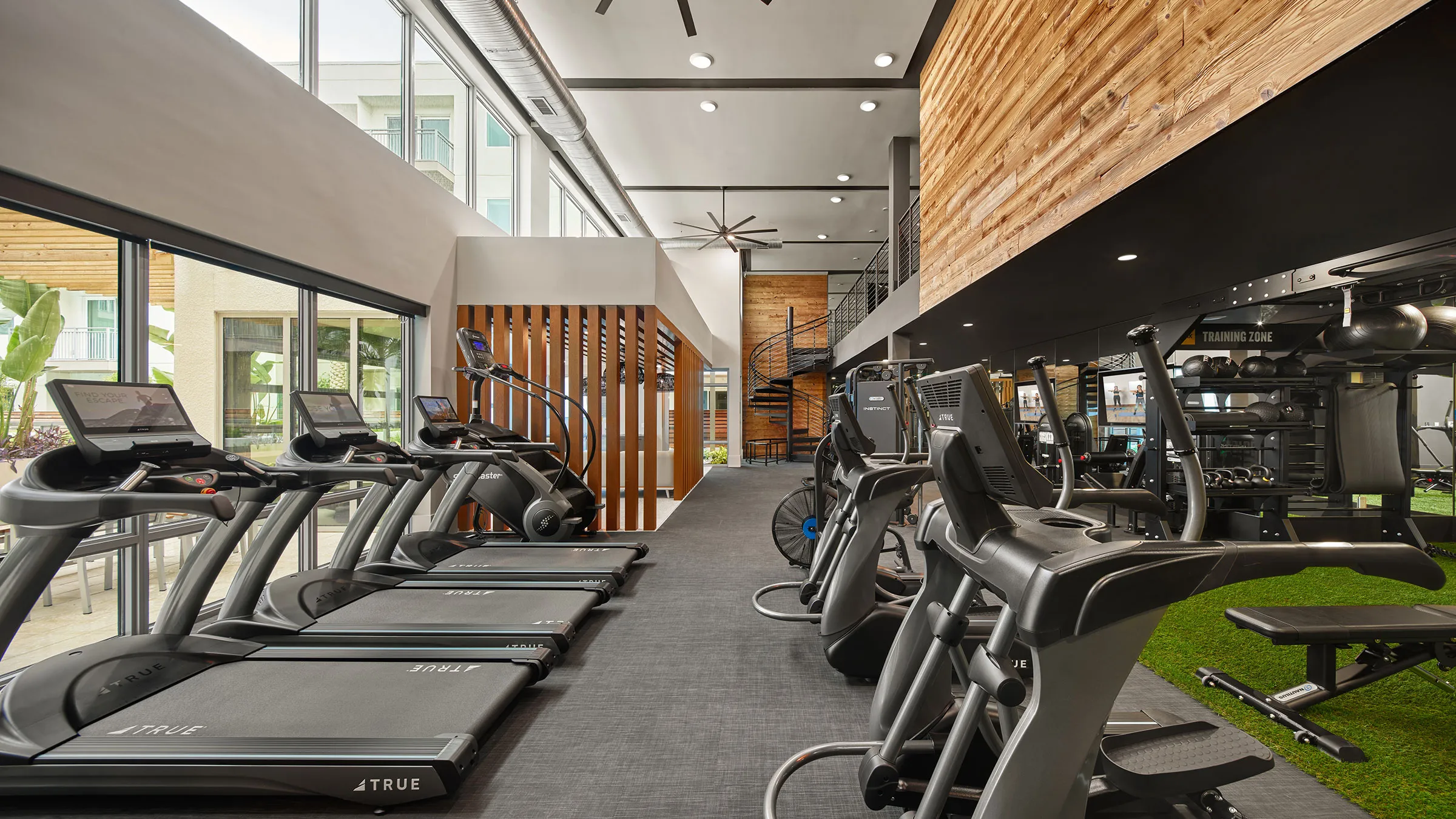 a room with treadmills and exercise machines