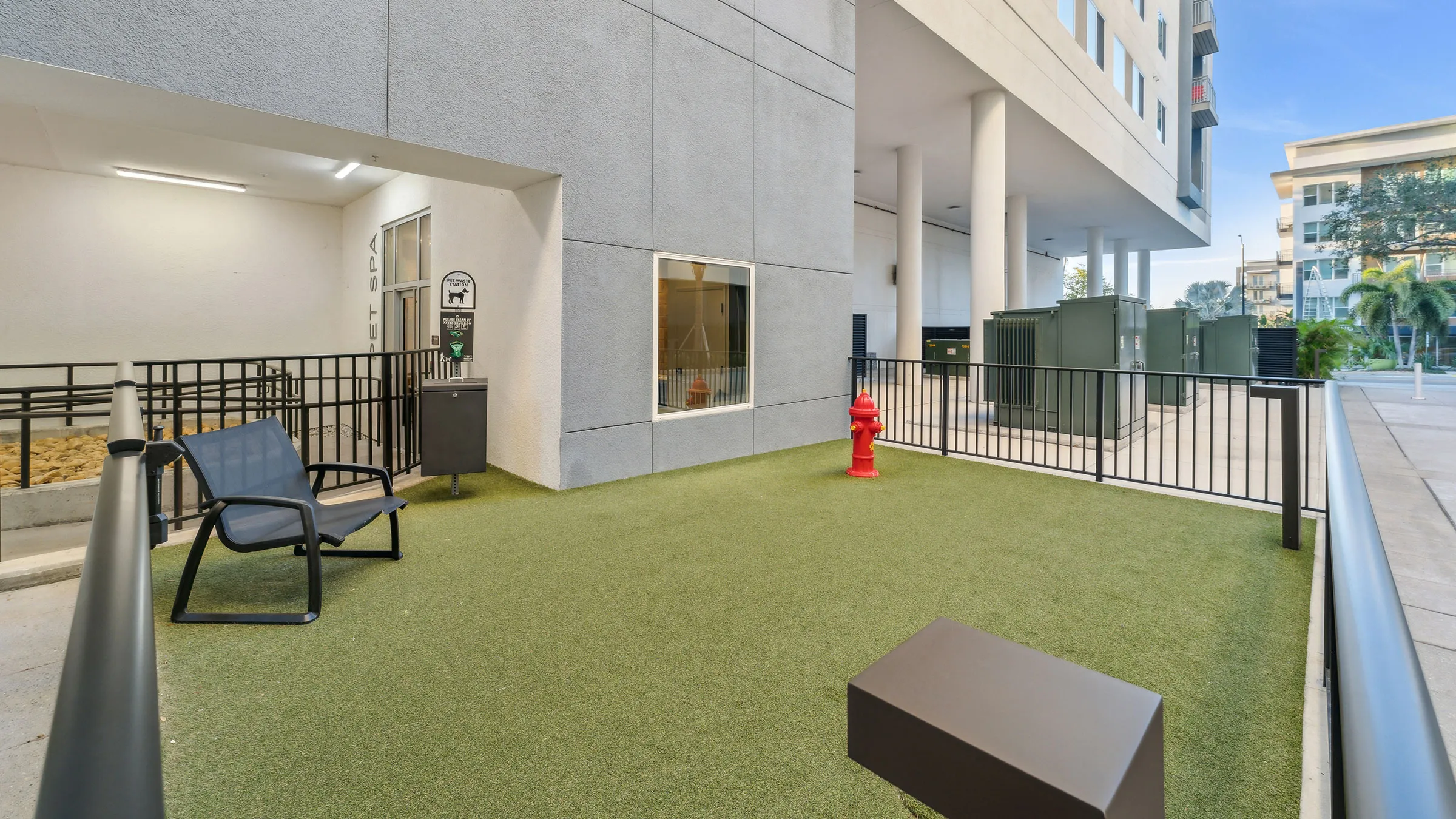 a fire hydrant on a green lawn