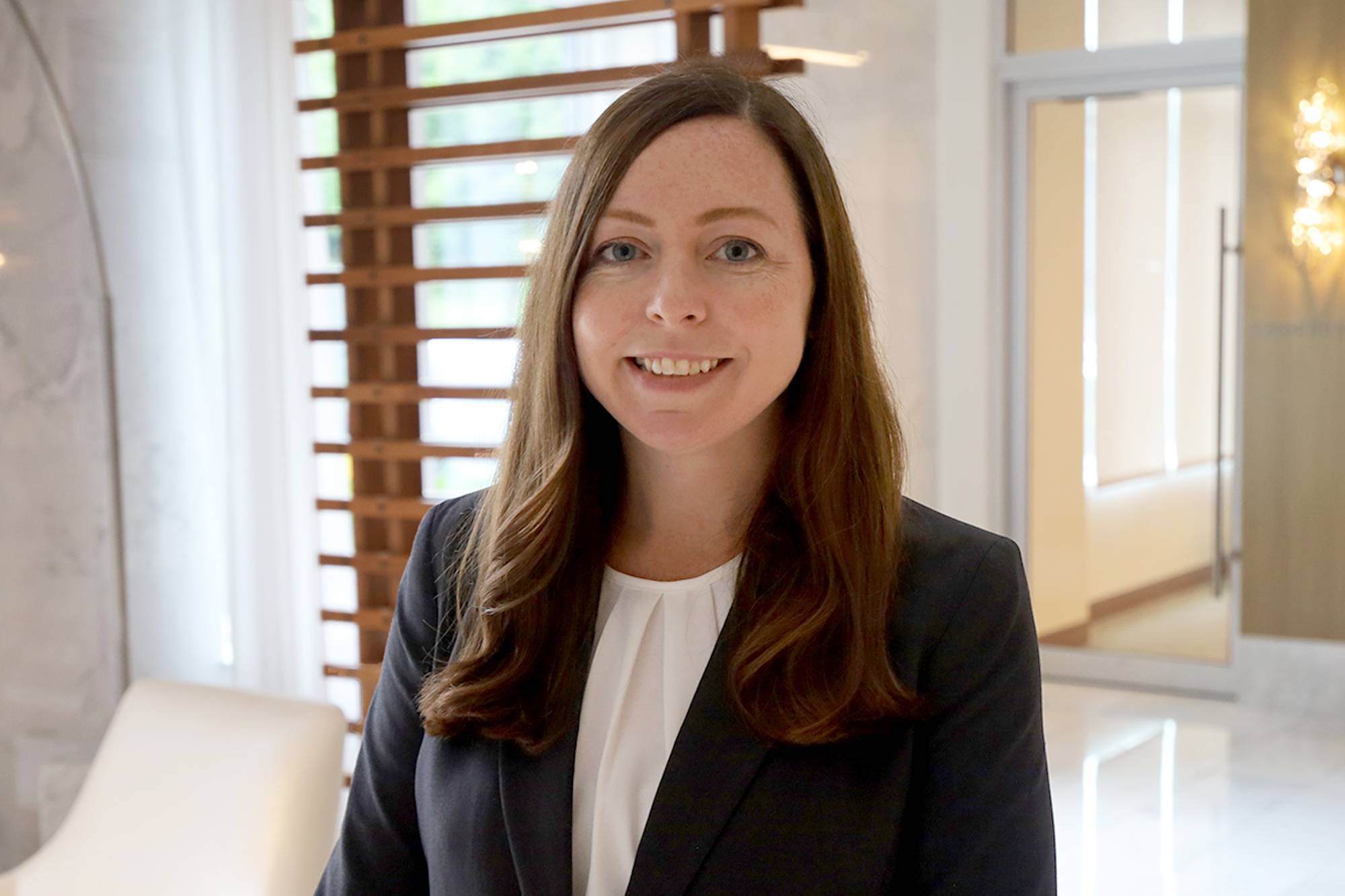 AVE Web Marketing Manager in a suit