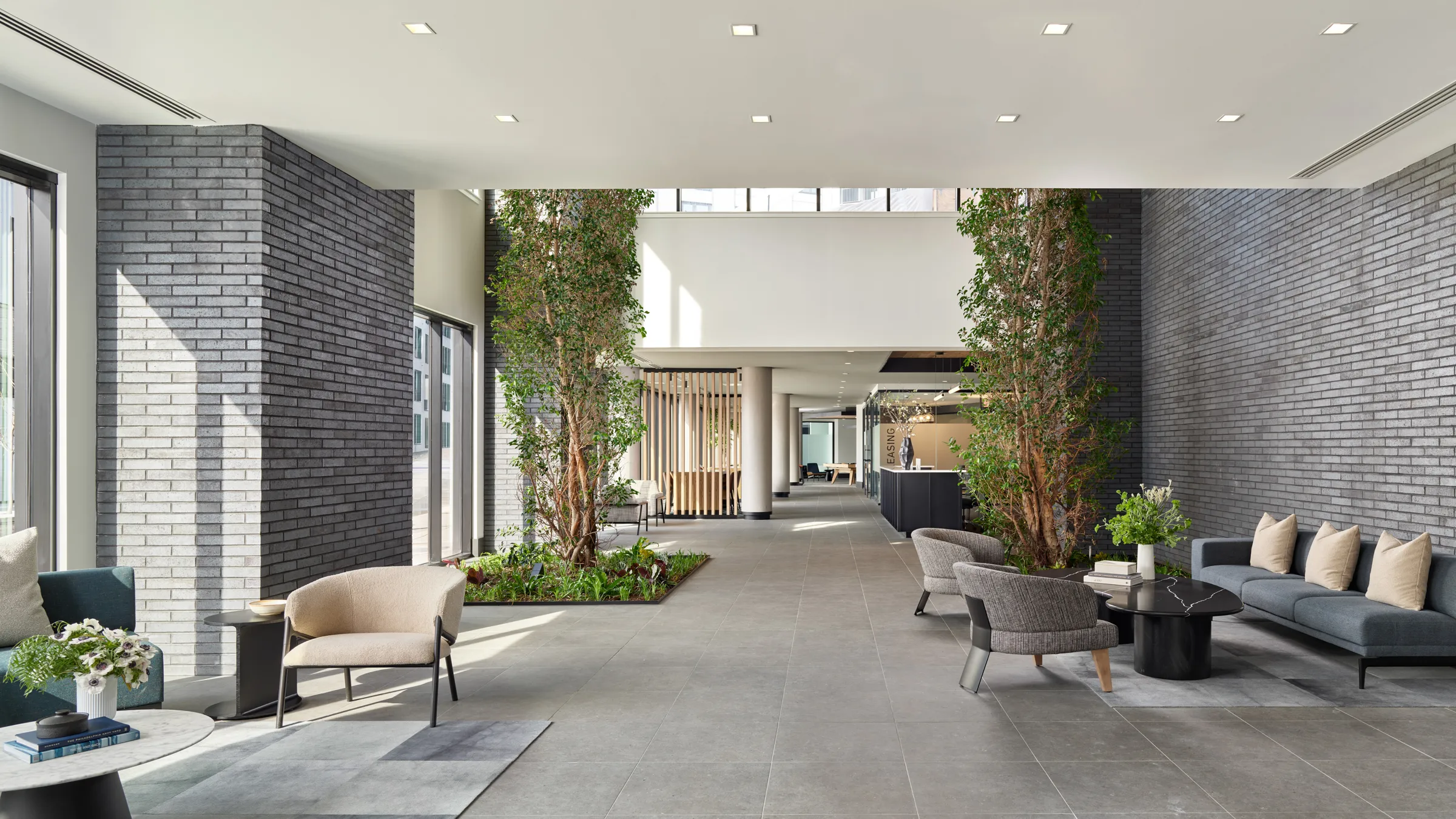 ave normandy apartment lobby with living atrium