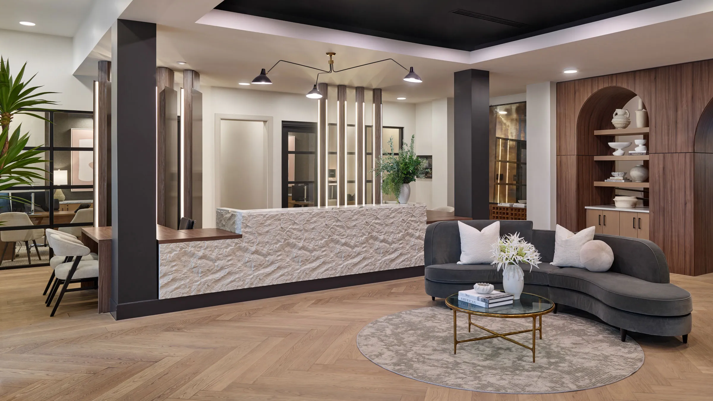 a lobby with a couch and a table