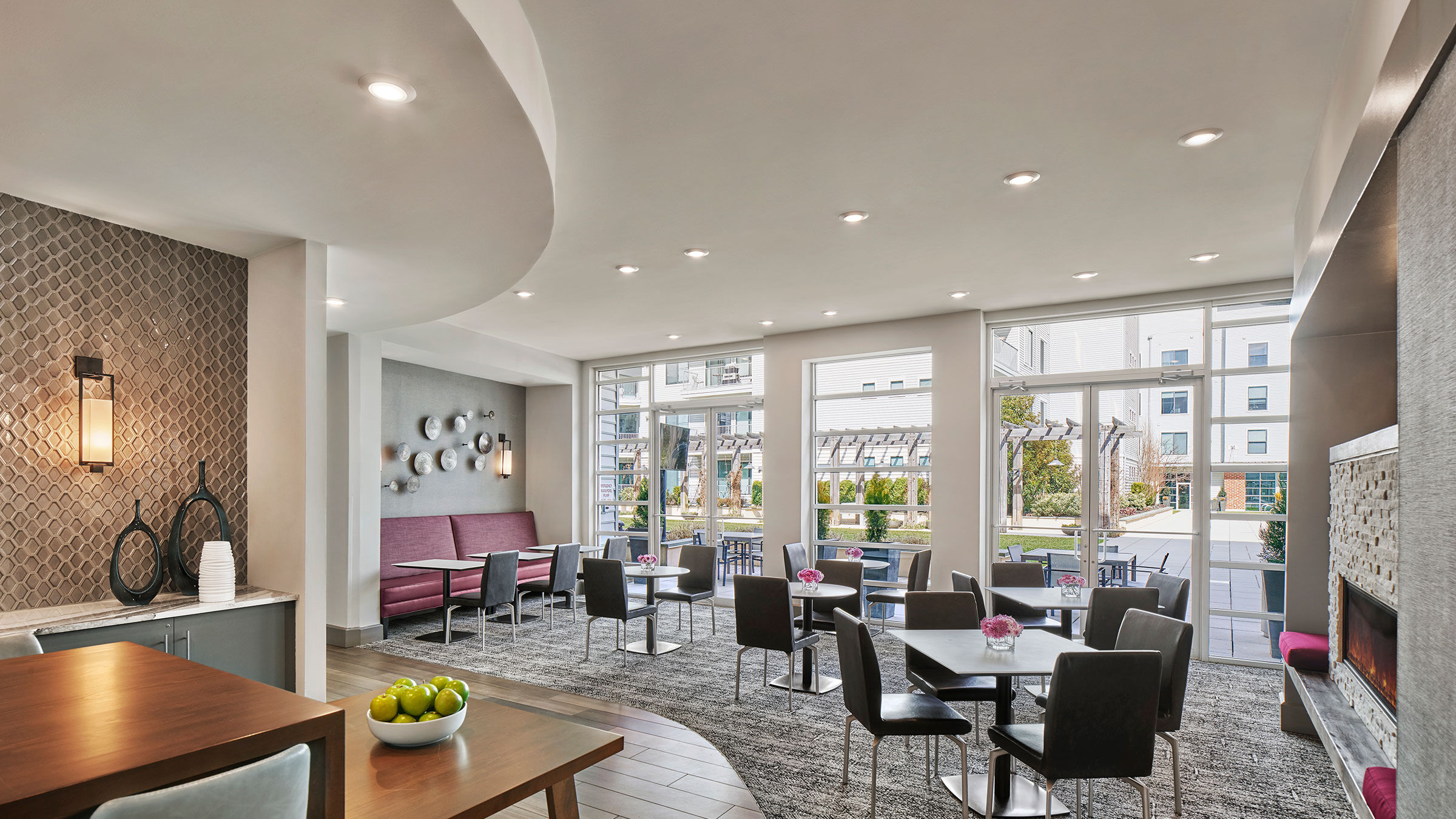 a room with tables and chairs