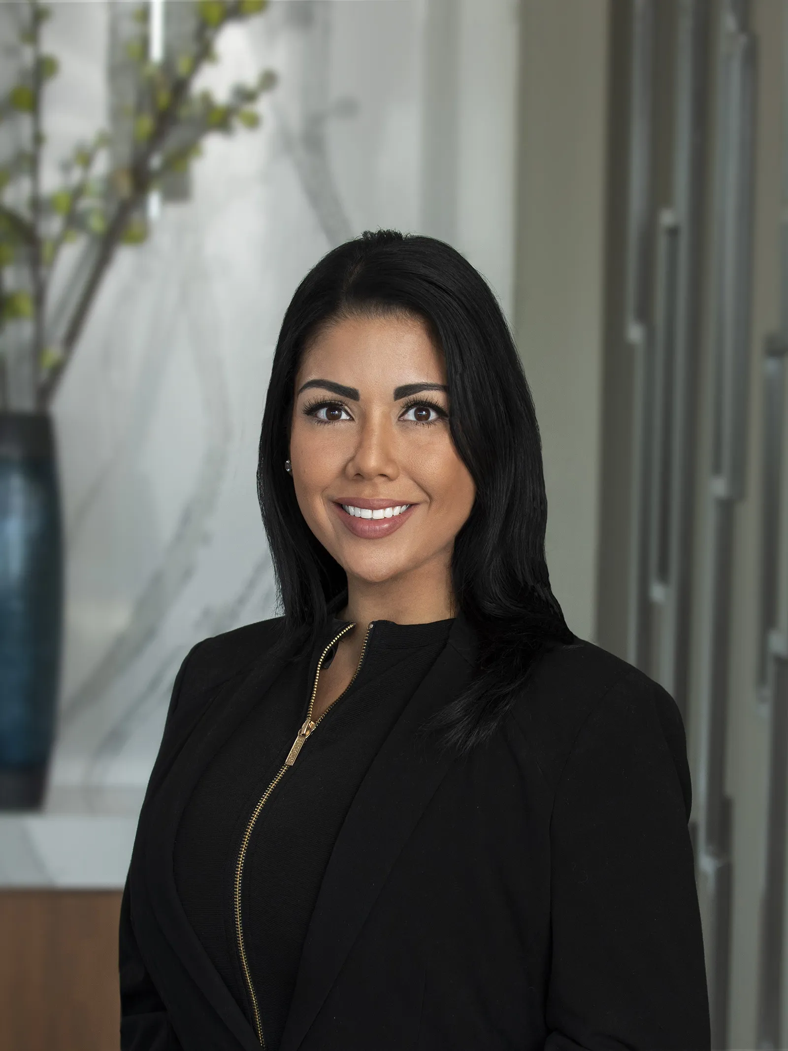 a woman in a black jacket