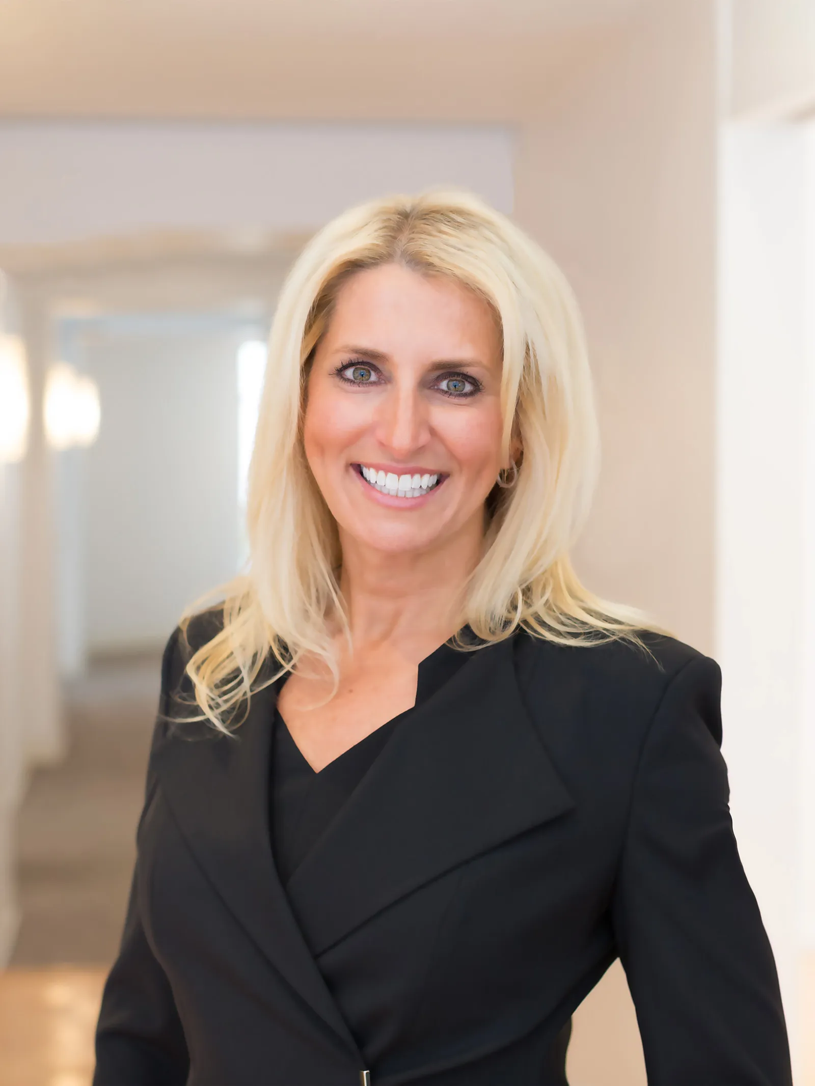 a woman smiling at camera