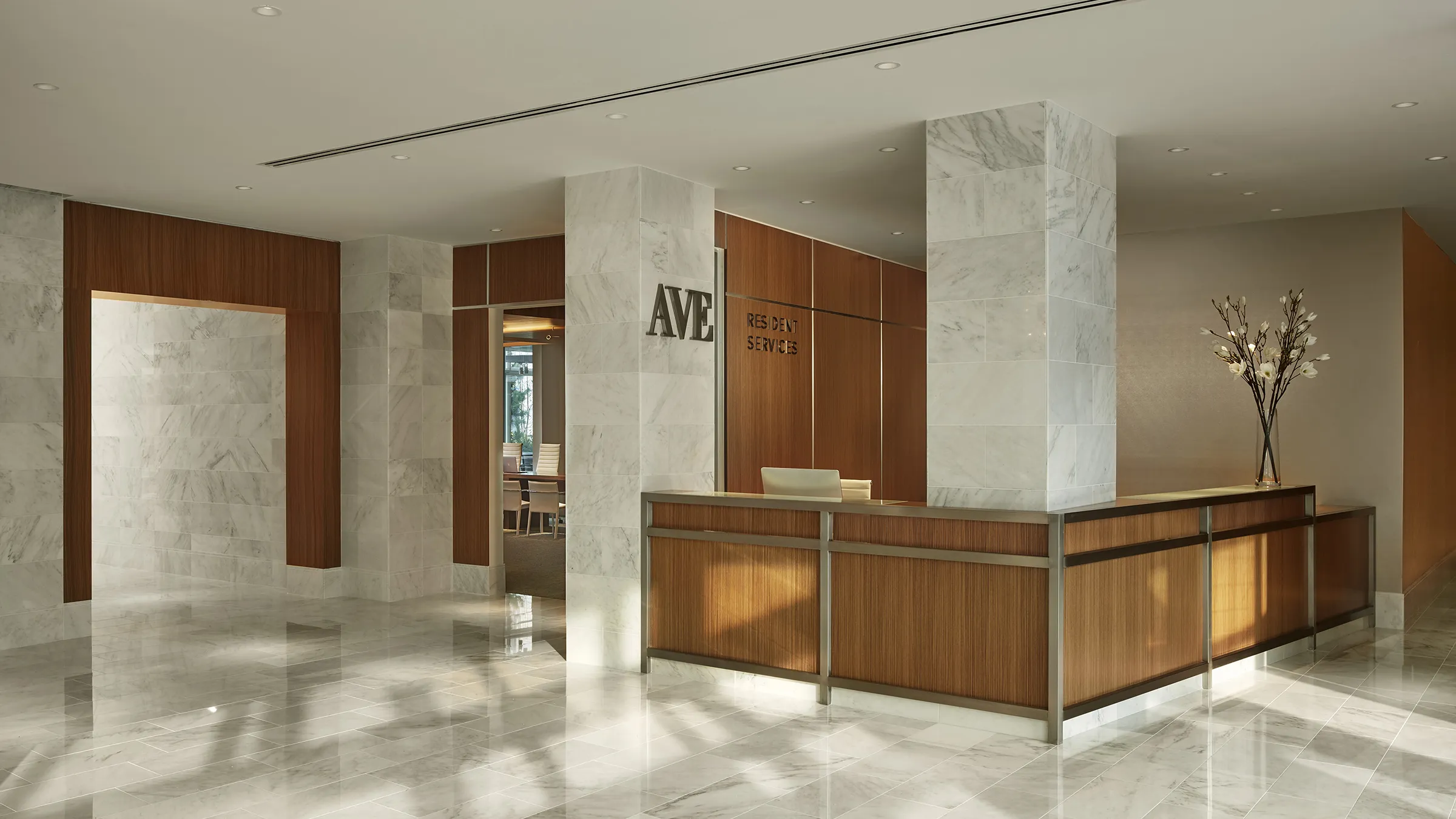 a marble and wood reception desk