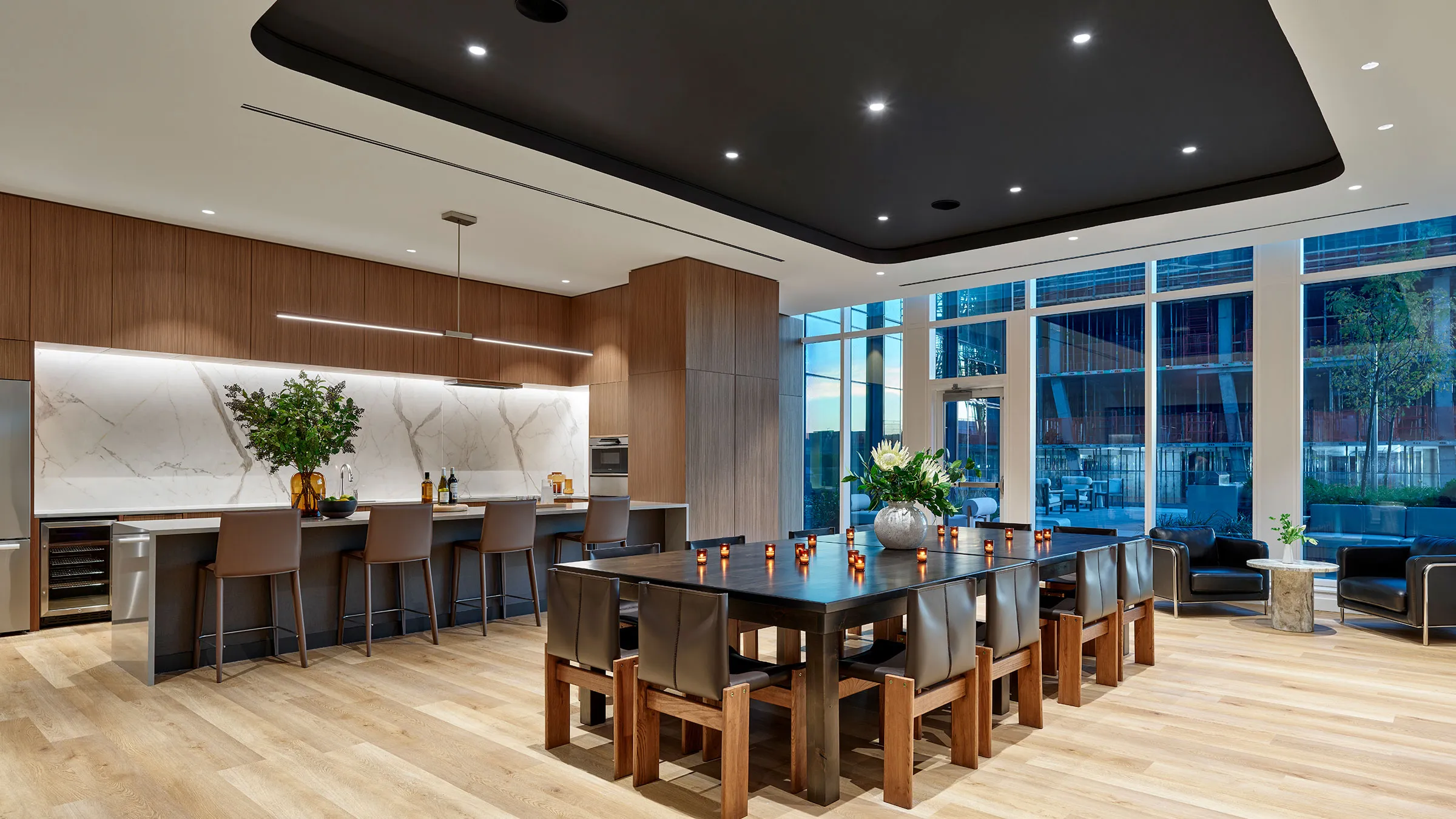 a large dining room with a long table and chairs