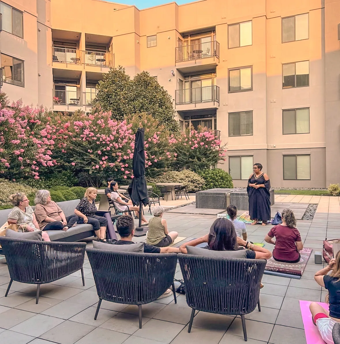 a group of people sitting on a patio