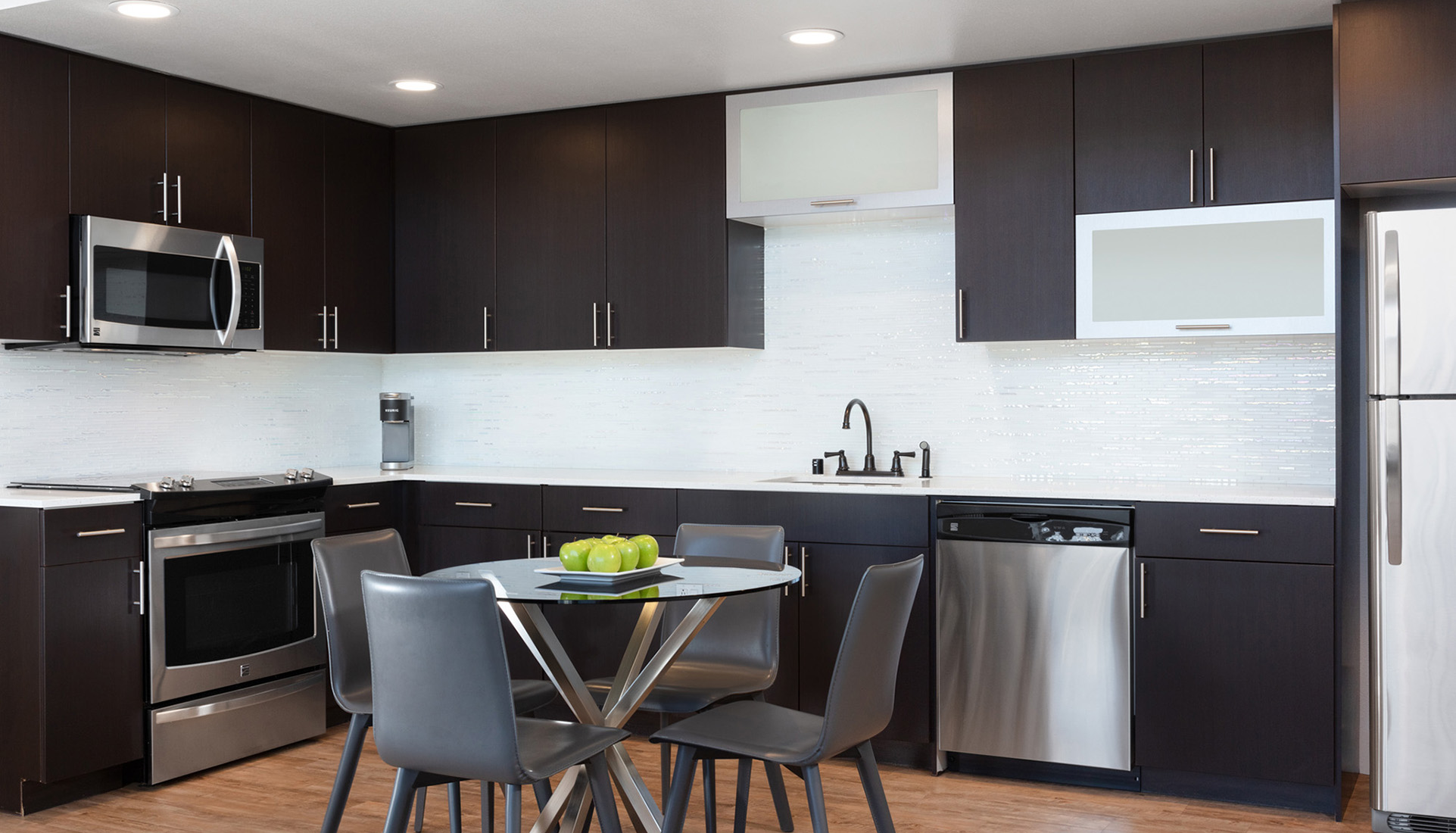 AVE Walnut Creek apartment kitchen features stainless steel appliances Quartz countertops 