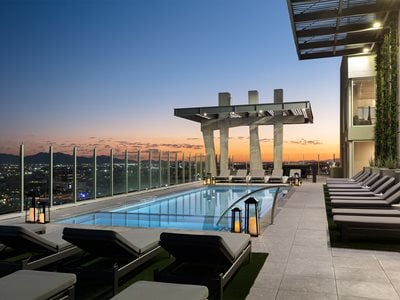 pool terrace with lounge chairs overlooking Phoenix