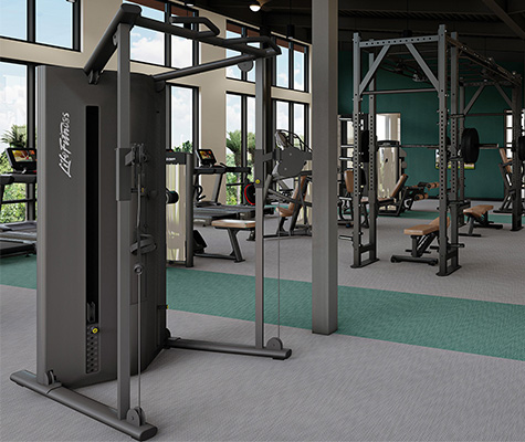 Fitness Center with green and gray flooring, fitness machines and steels beams