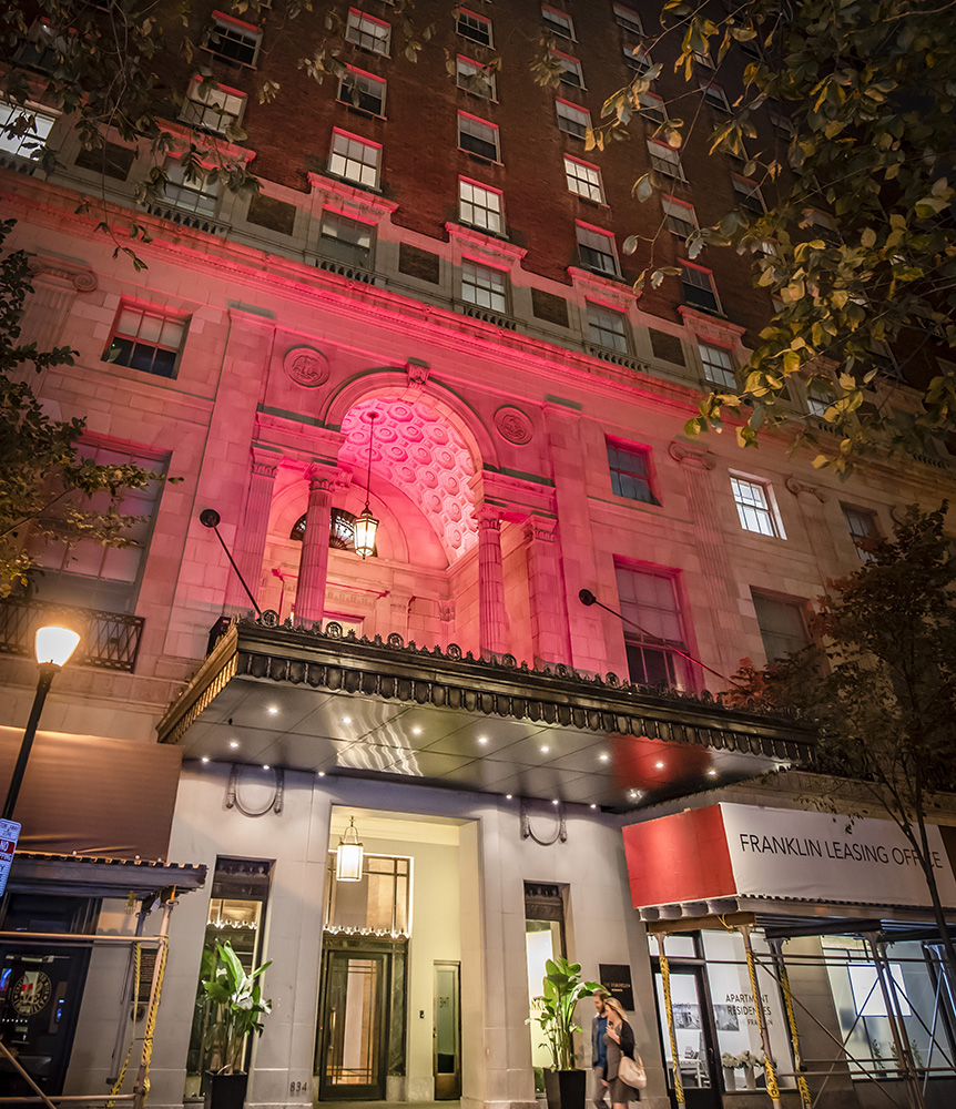 Franklin Residences entrance in pink light